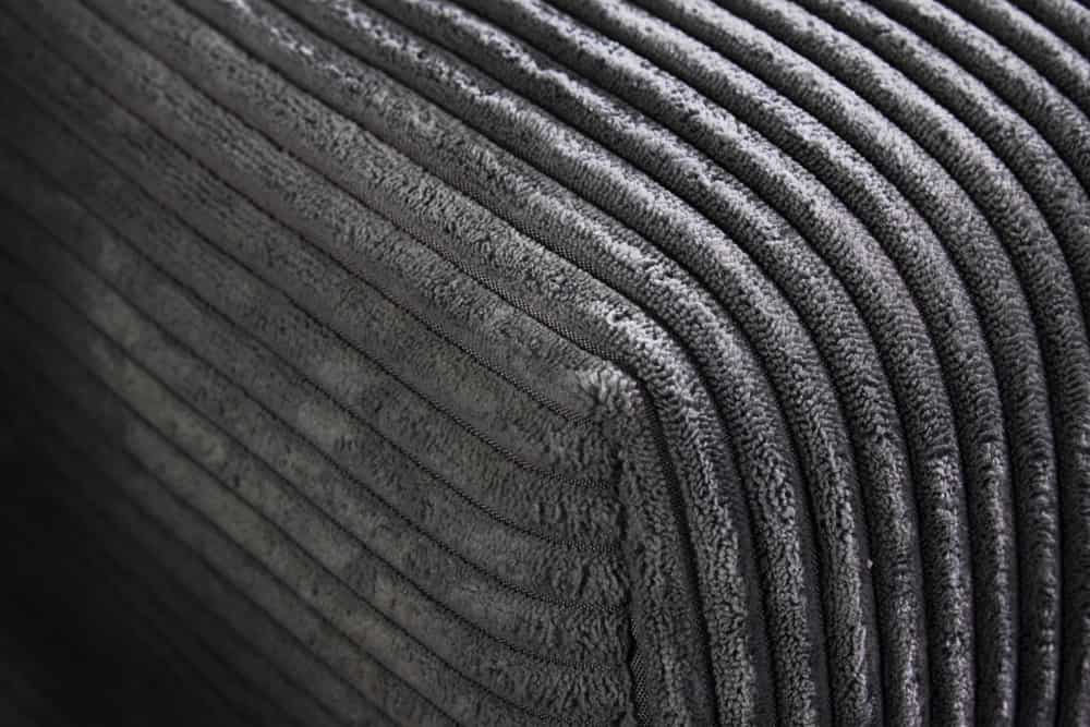 Modernes Ecksofa KENT 220cm dunkelgrau Cord inklusive Hocker Federkern Wohnlandschaft