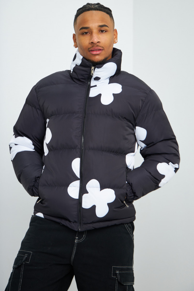 Doudoune noir et blanche matelassée à fleurs