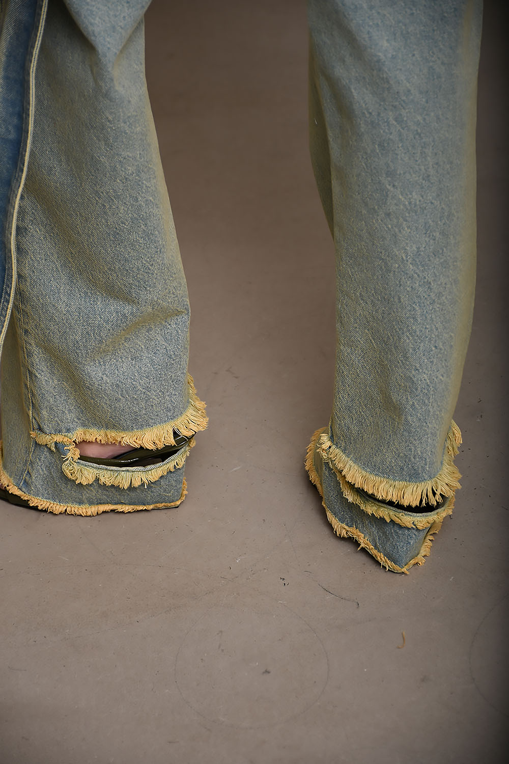 Lisa belt adorned loose fit denim jeans