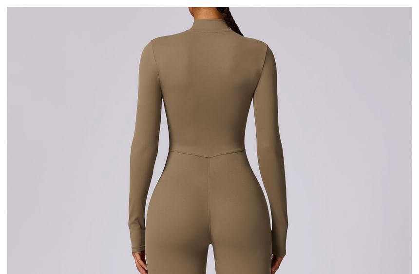 Skinniano - Sportjumpsuit met lange mouwen en halve rits