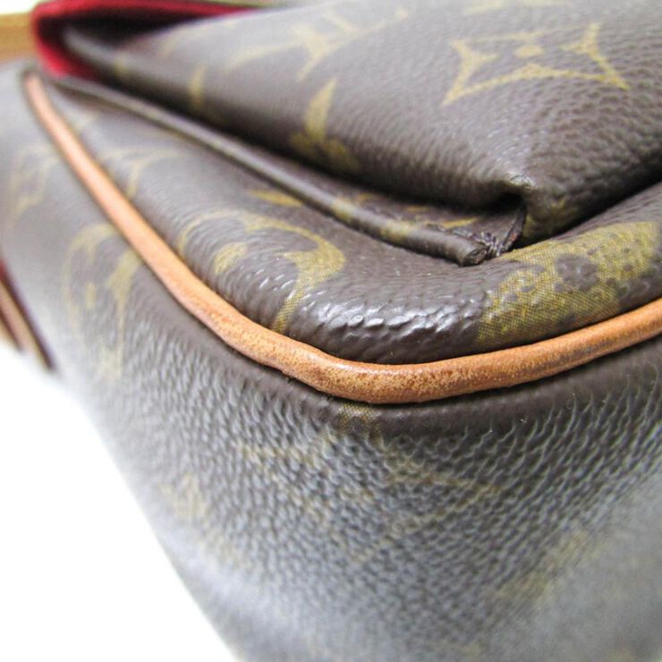 Louis Vuitton Vintage Louis Vuitton Cite Brown