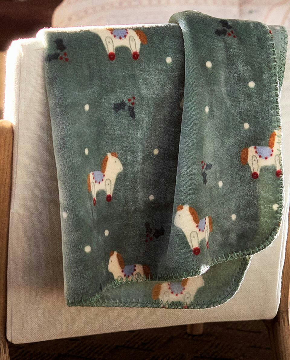 Manta infantil de lã com cavalo de balanço de Natal
