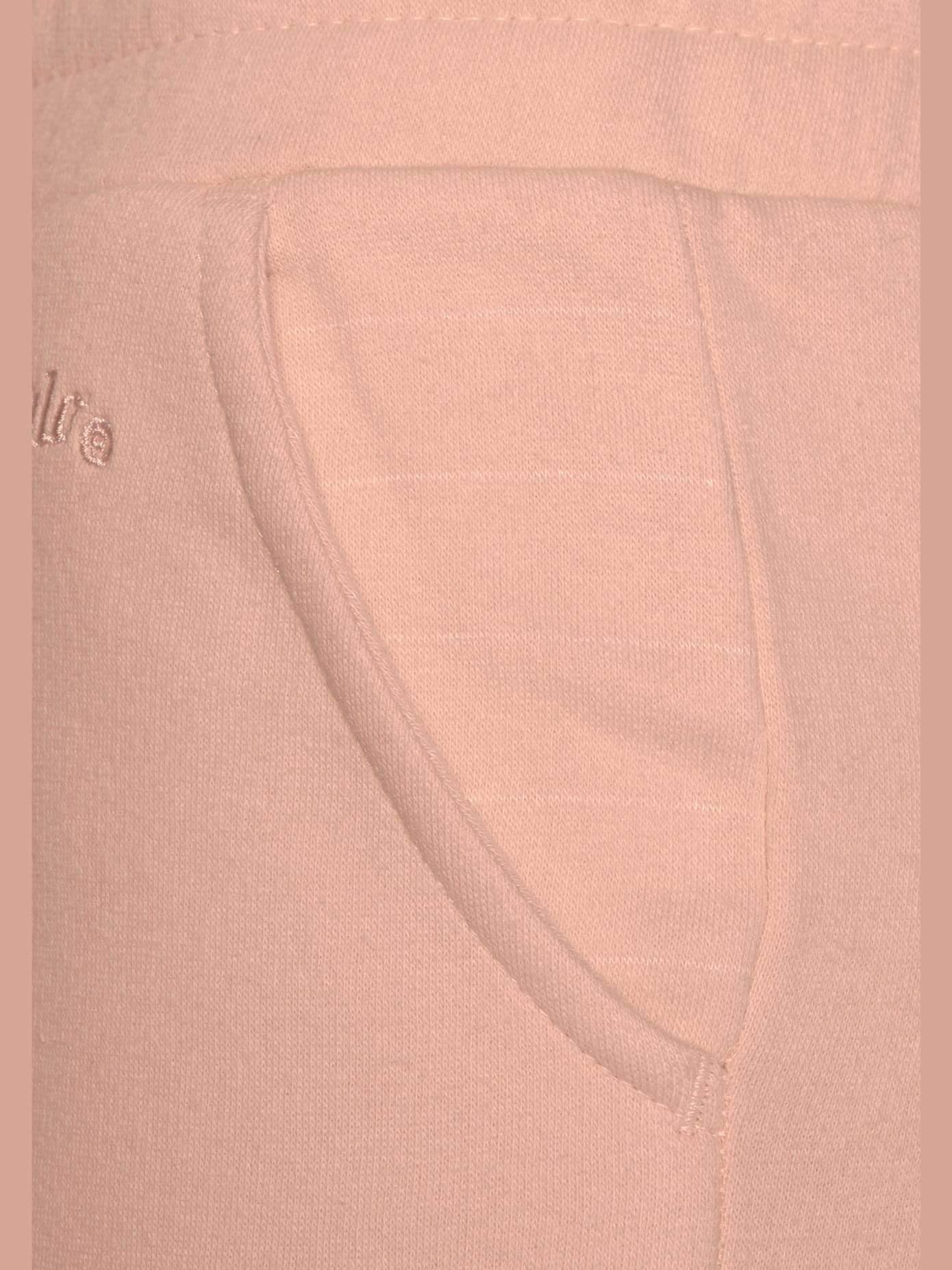 Pantalon molletonné avec poches latérales fendues