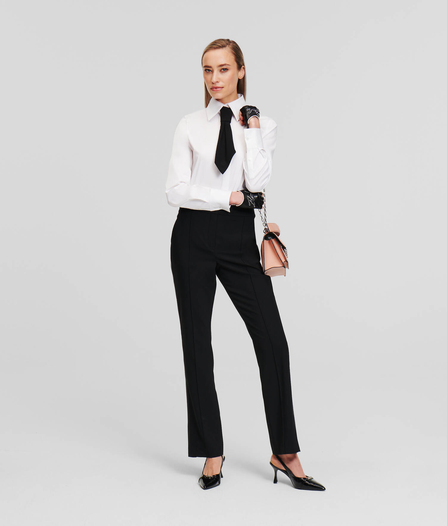 PANTALON EN SIMILI-CUIR À EMPIÈCEMENTS