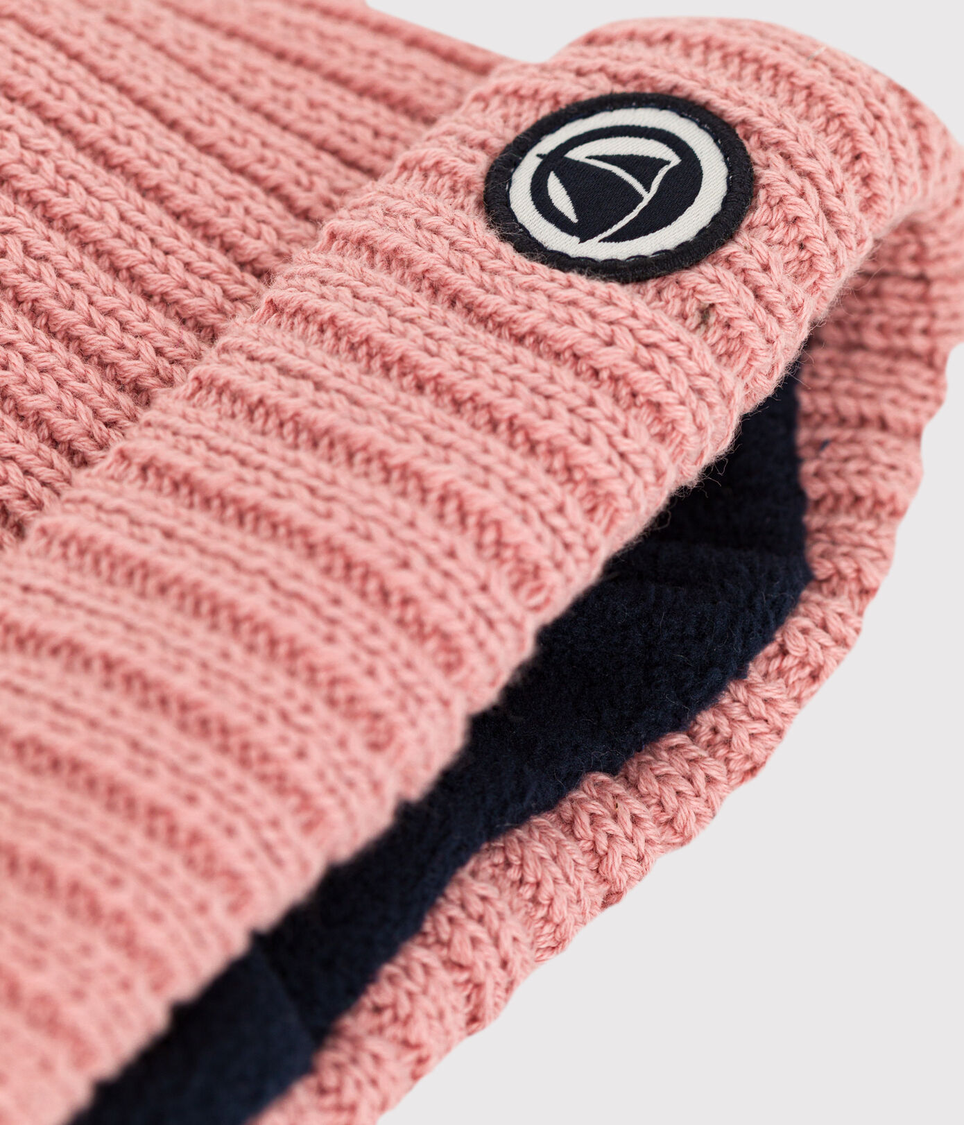 Bonnet bébé en tricot doublé en polaire recyclée