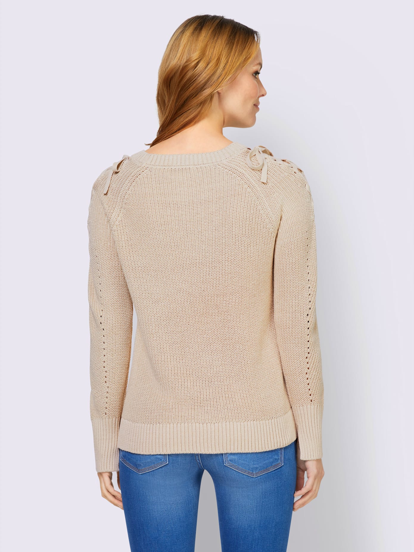 Pull laçage mode aux manches