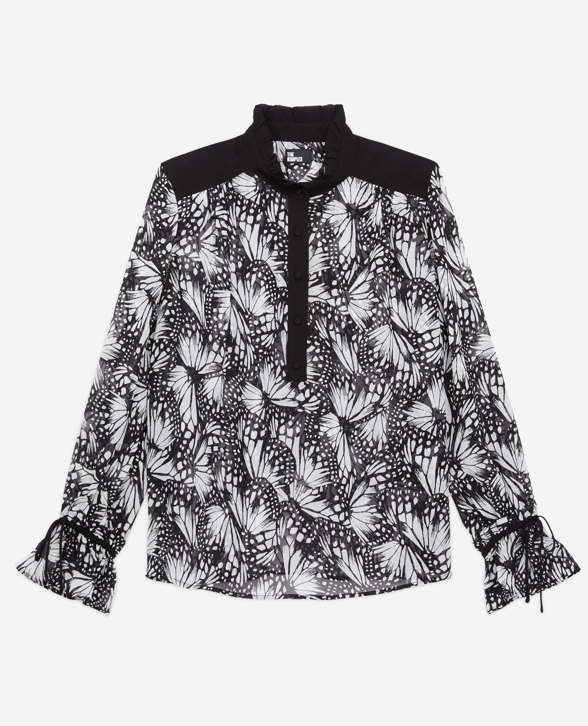 Top imprimé avec détails contrastés