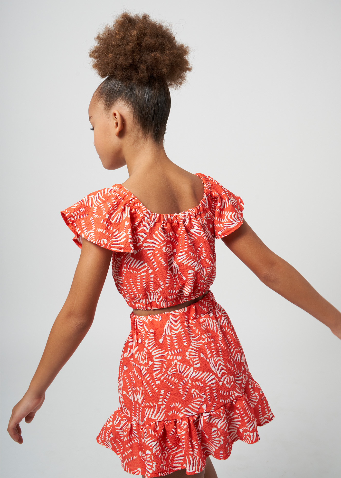 Conjunto de duas peças, blusa e saia, infantil