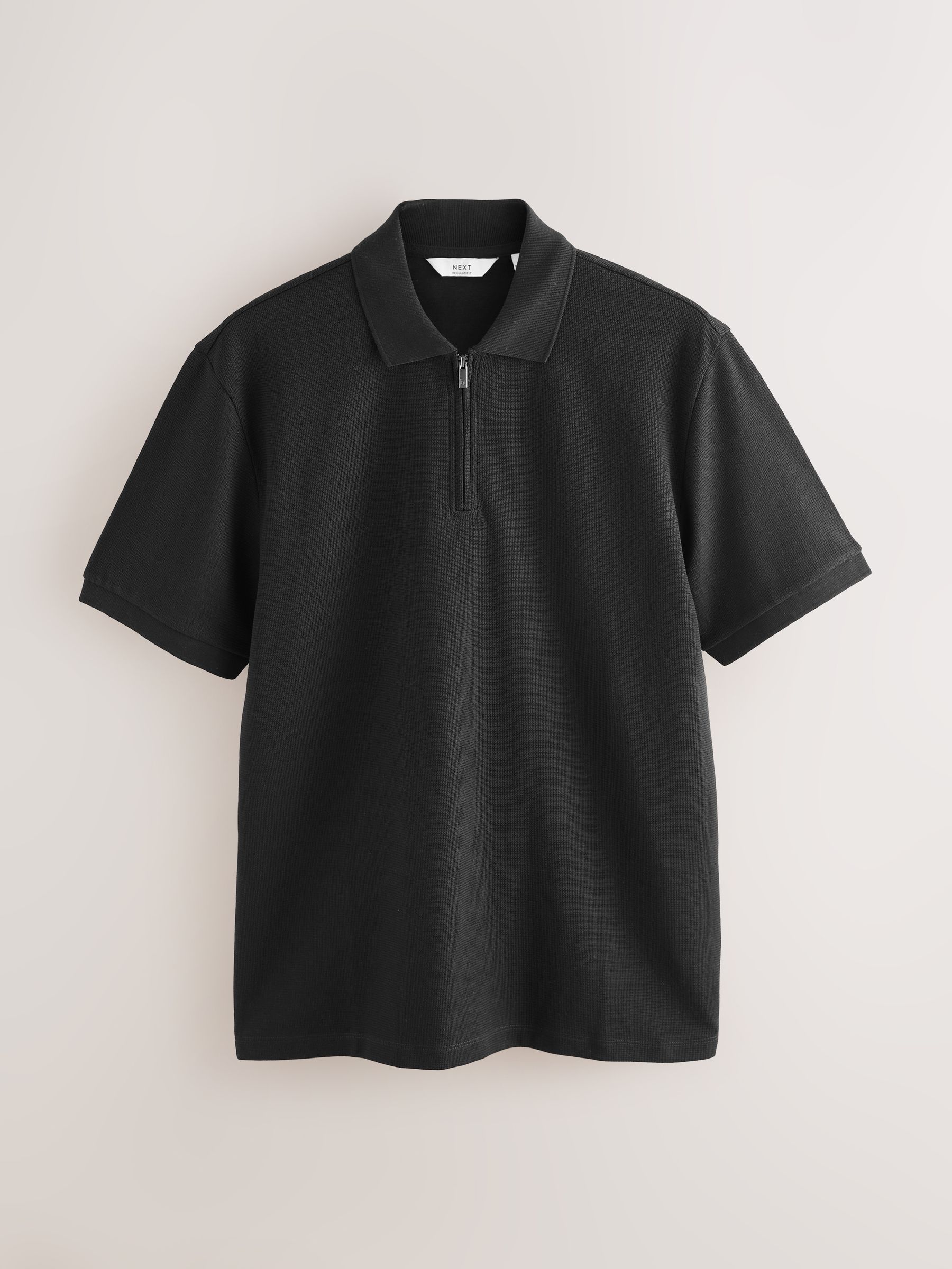 Zwart - Smart poloshirt met textuur en rits