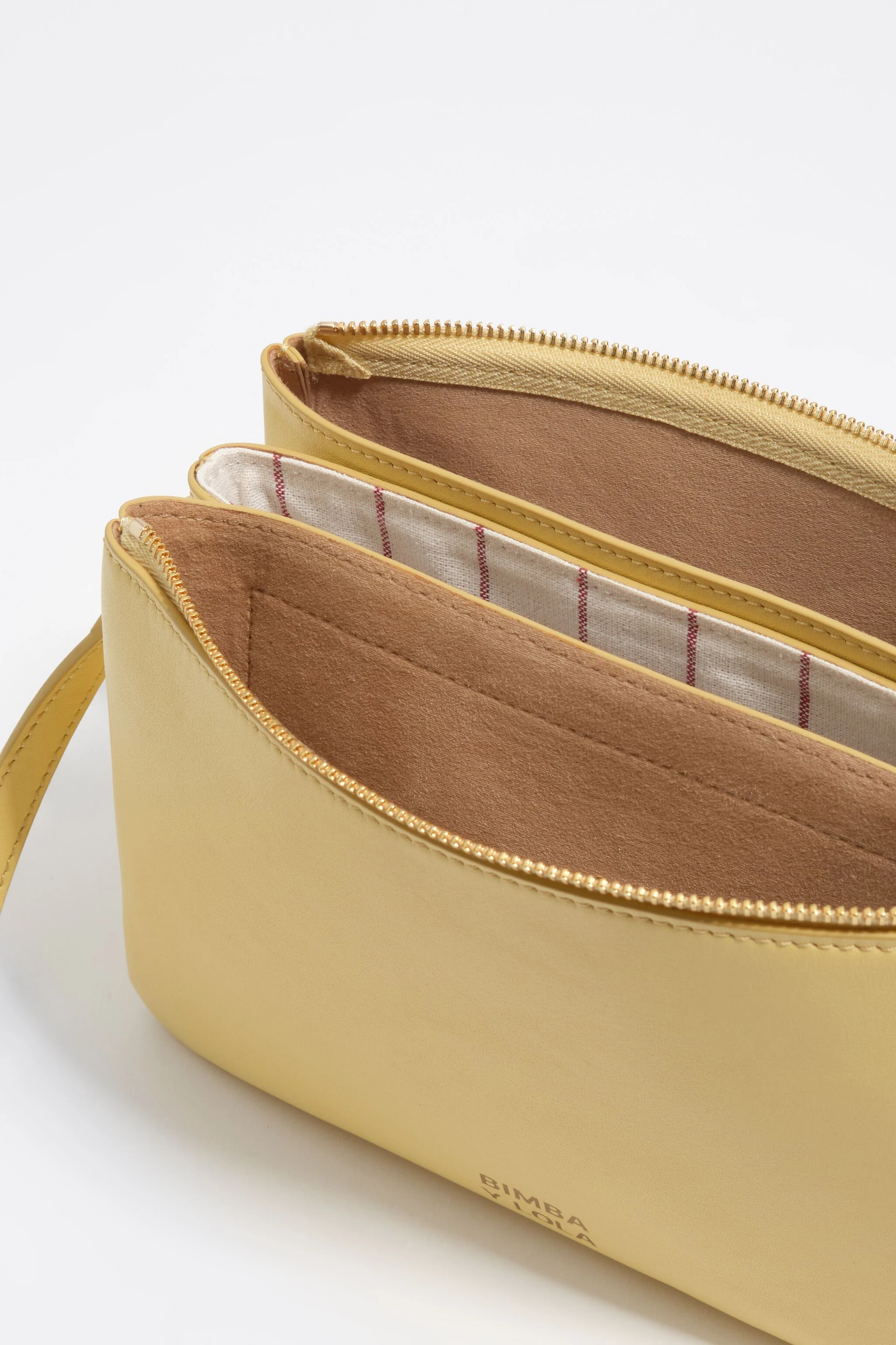 Bolsa clutch tripla mini banana em couro