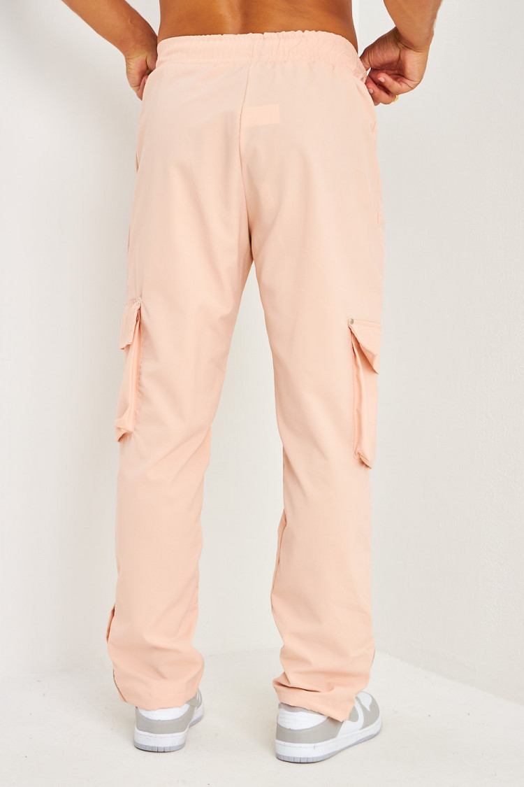 Pantalon de jogging rose poches cargo et zippé aux chevilles