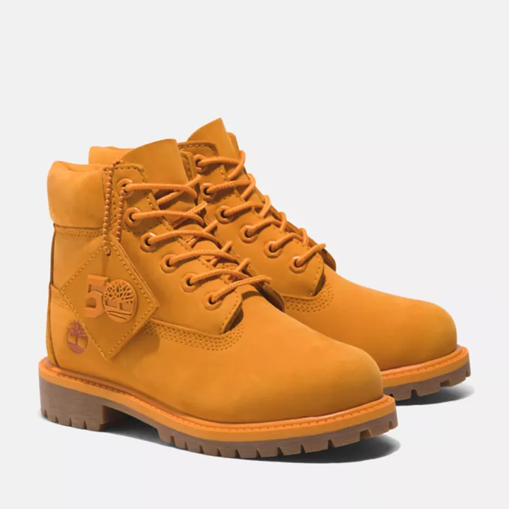 Bota Timberland Premium de 6 polegadas impermeável, edição especial 50, para crianças, na cor laranja.