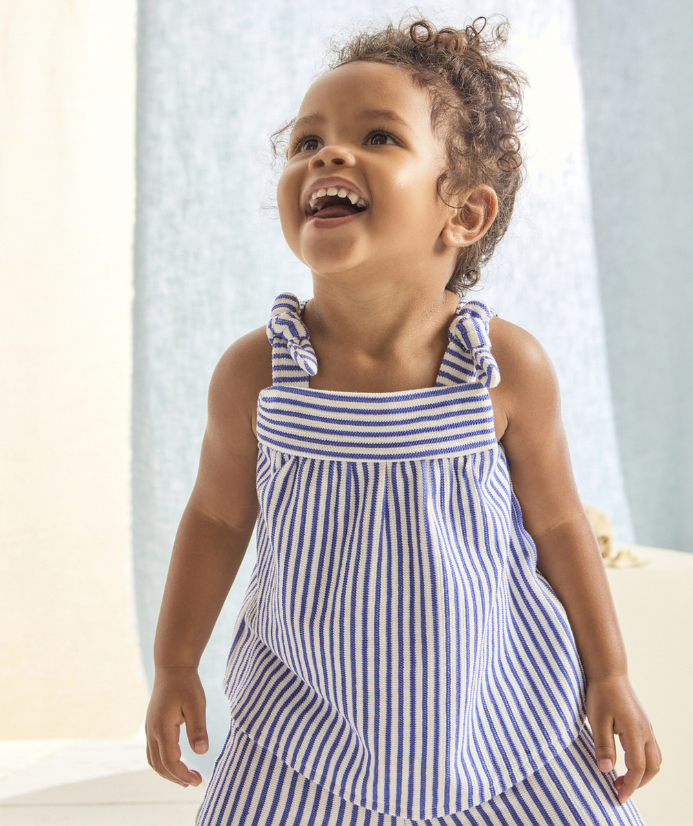 top bébé fille en fibres recycées écru et tricot côtelé à rayures bleues