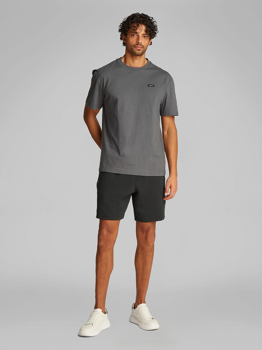 CALVIN KLEIN JEANS<br>Curto