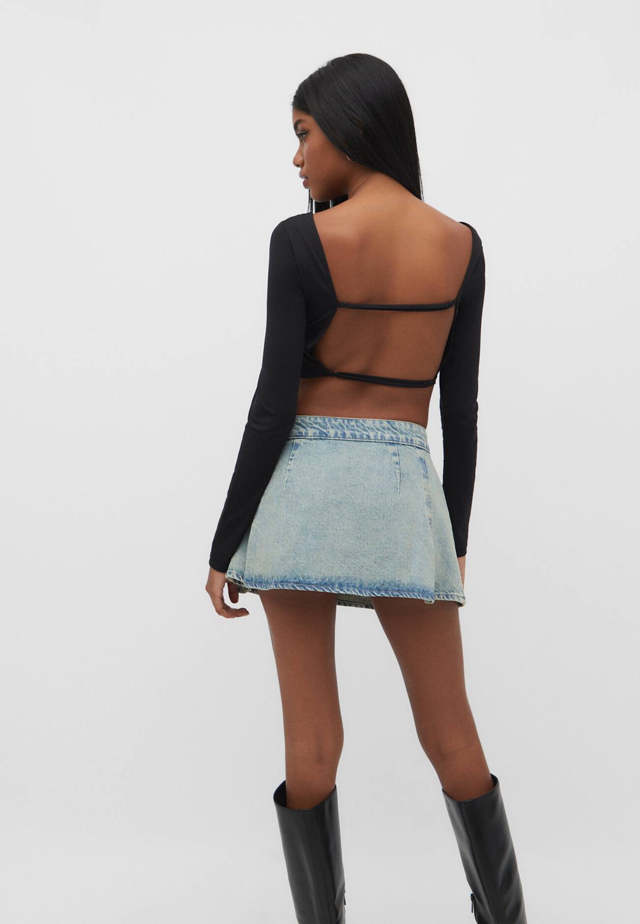 Minissaia jeans com fivelas