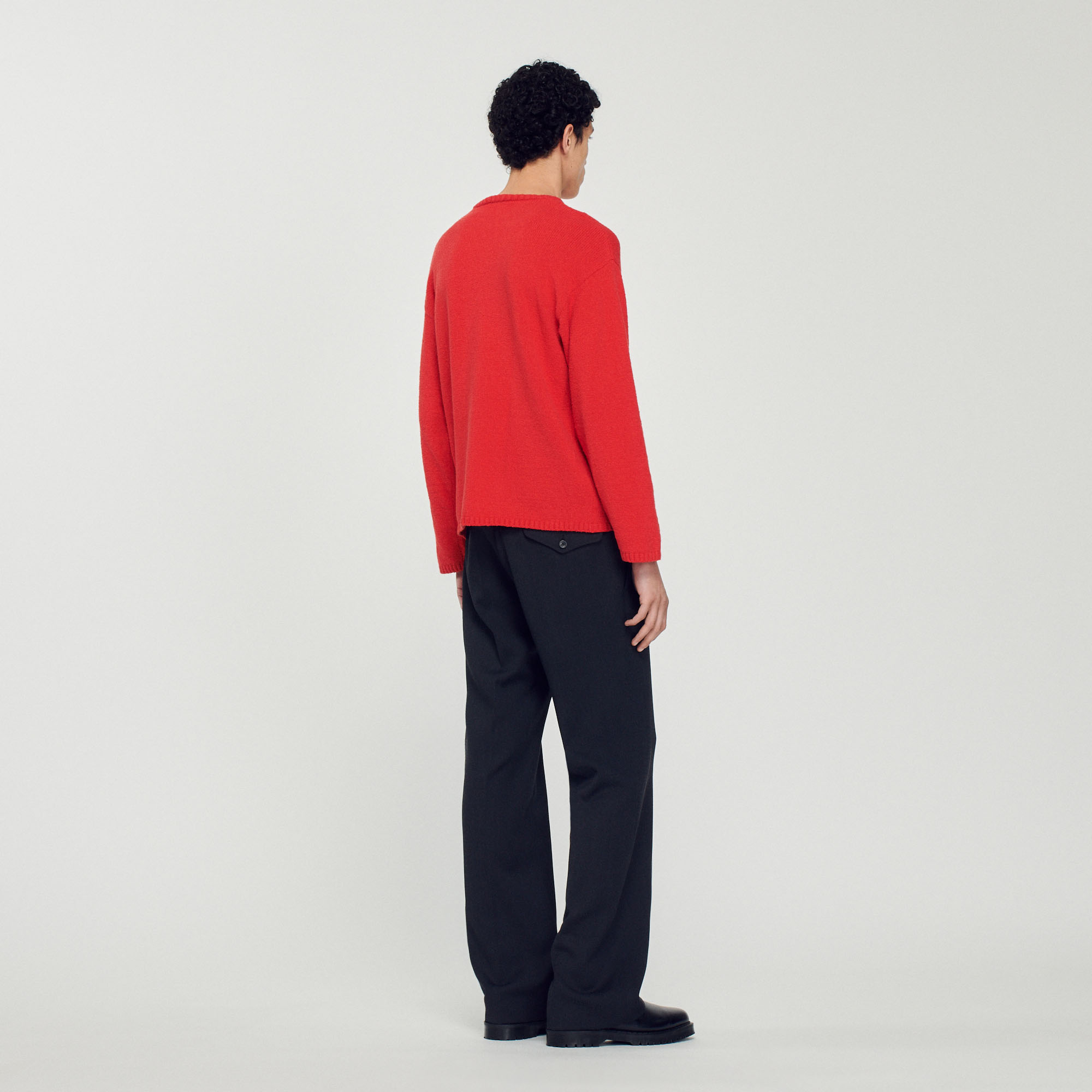 Pull en maille bouclee