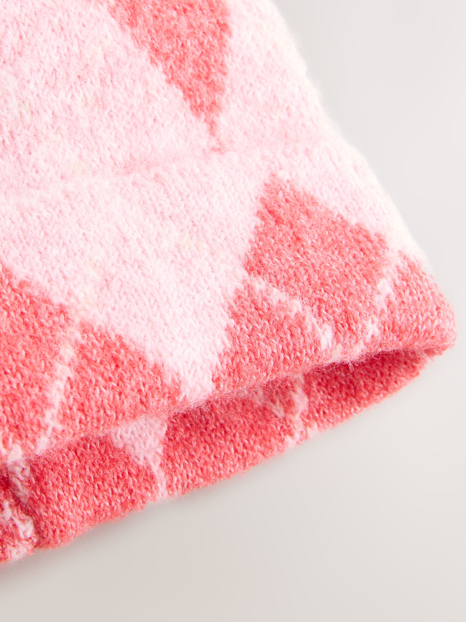 Rood/roze met ajourmotief - Gebreide beanie