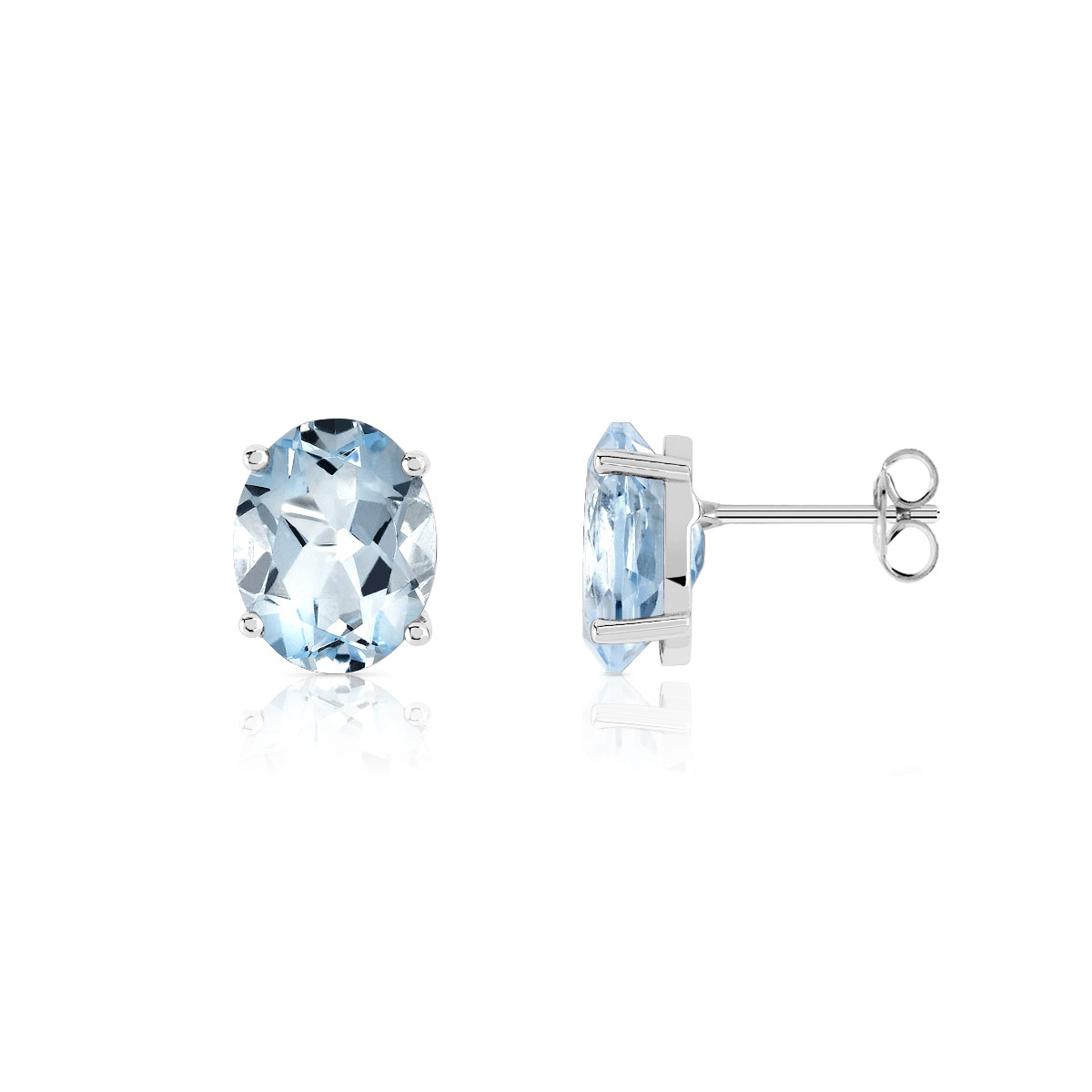 Boucles d'oreilles or 375 blanc topazes bleues traitées