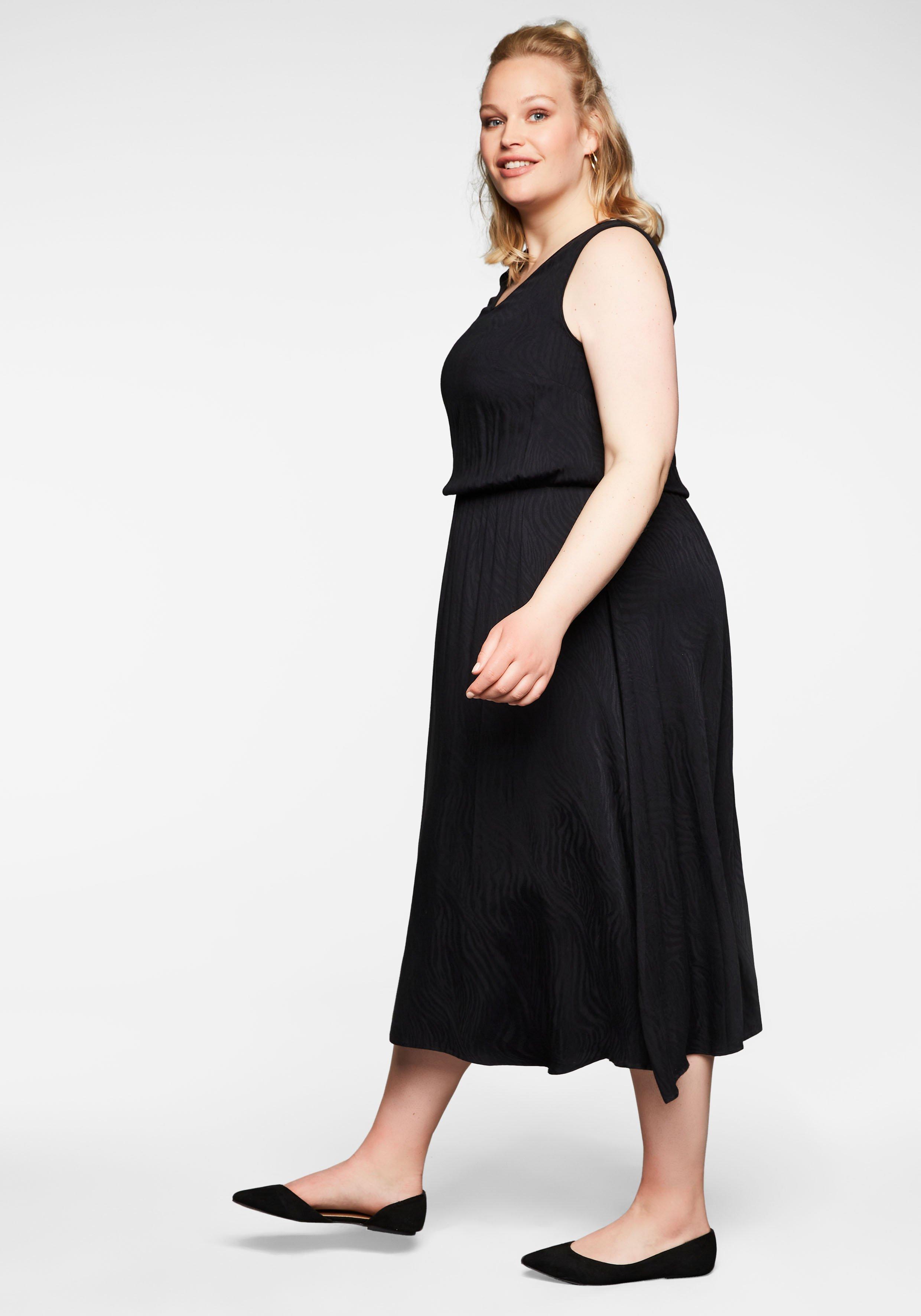 Set aus ärmellosem Kleid und kurzem Cardigan