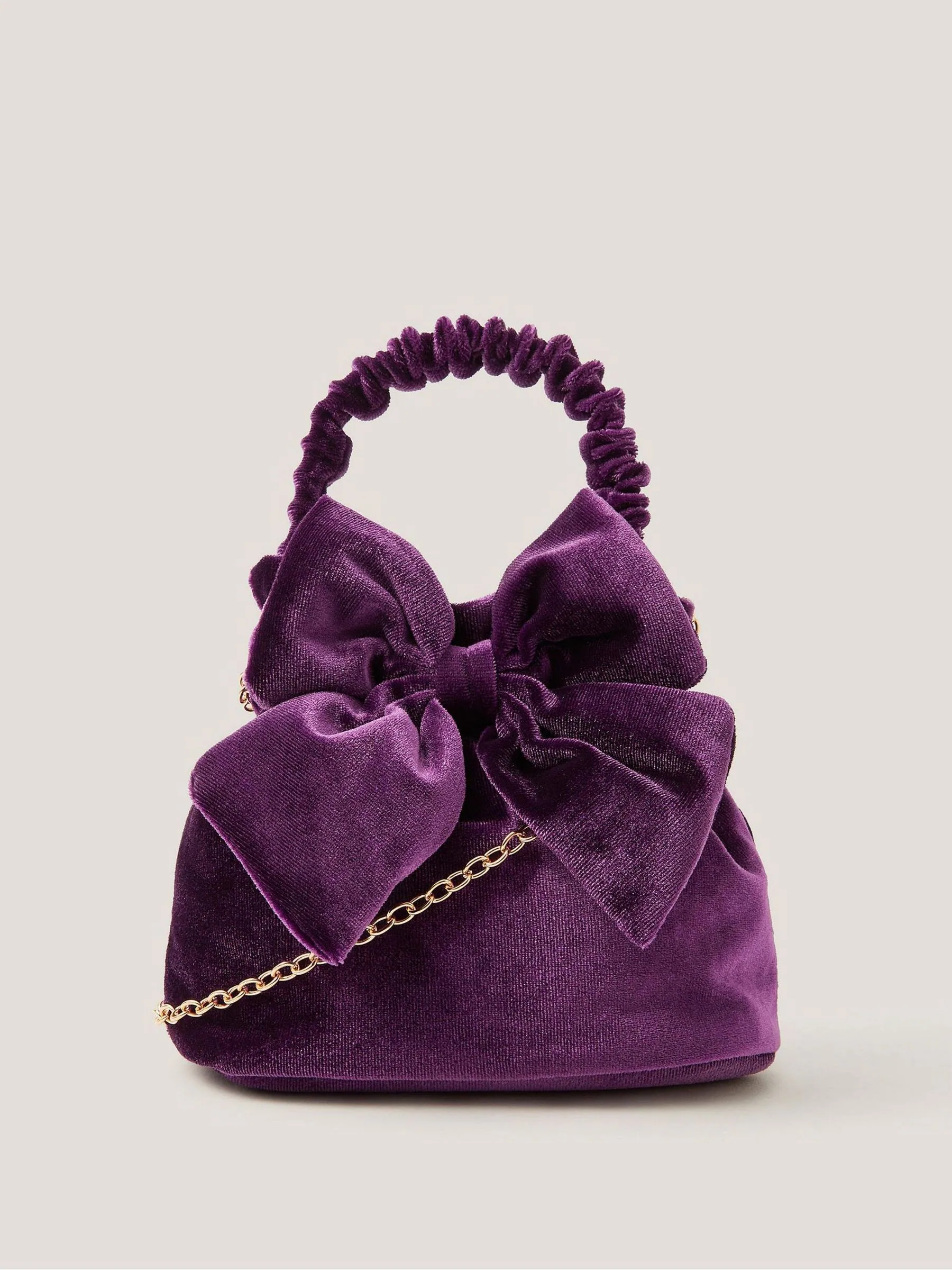 Monsoon Bow Velvet Pouch Bag