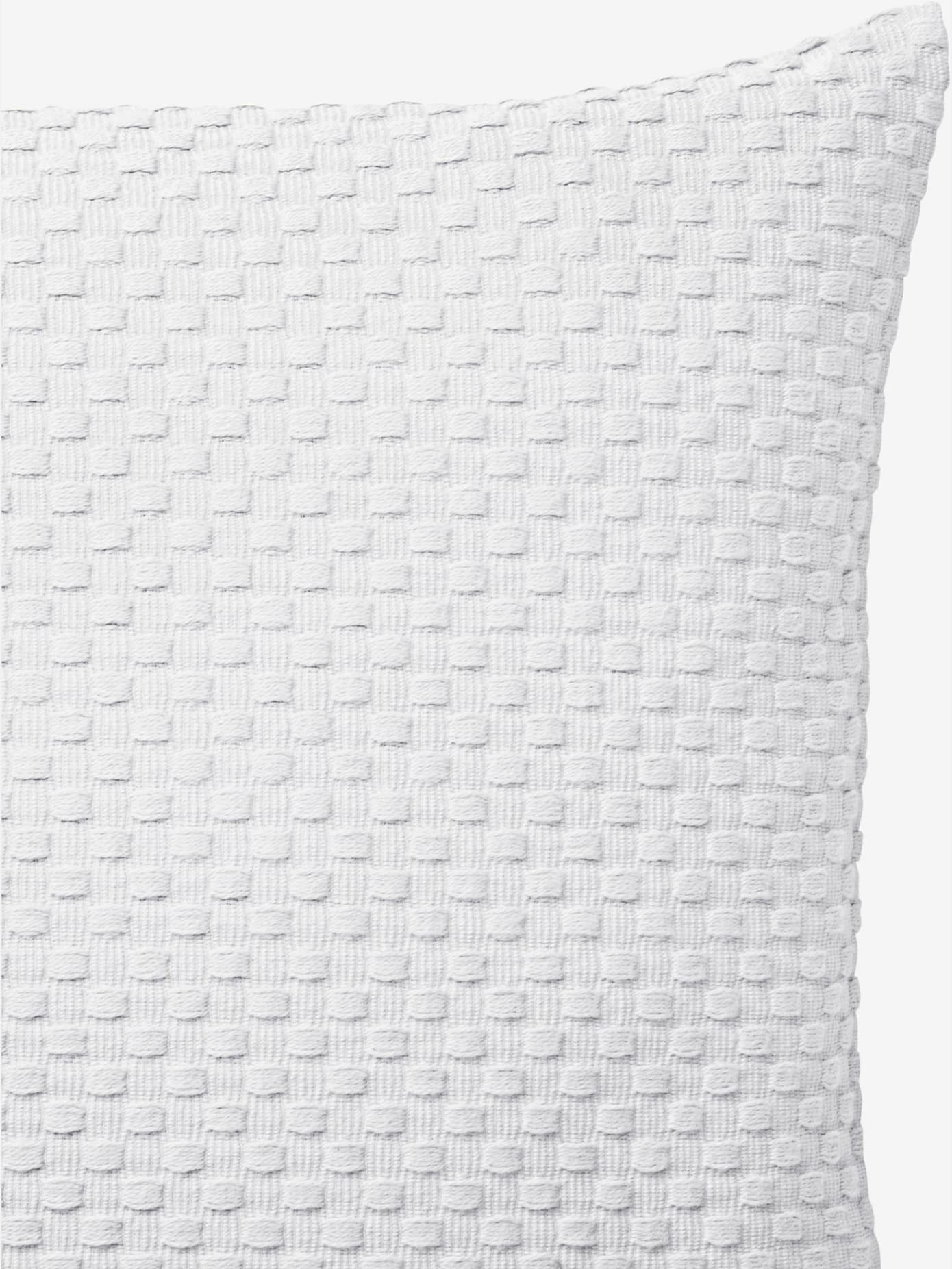 Housse de coussin tissé en relief