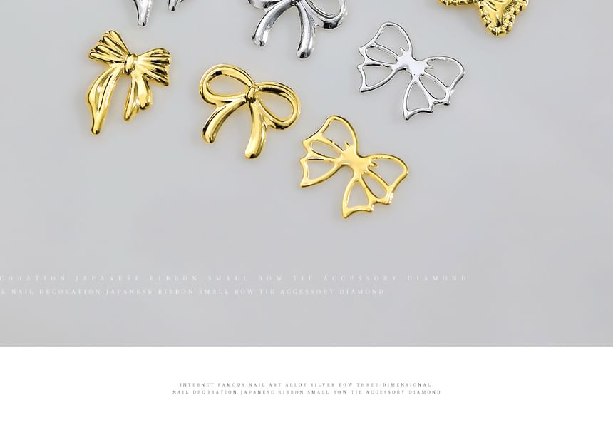 Padoma - Set van 50: Nail Art-decoratie met strik van legering (verschillende ontwerpen)