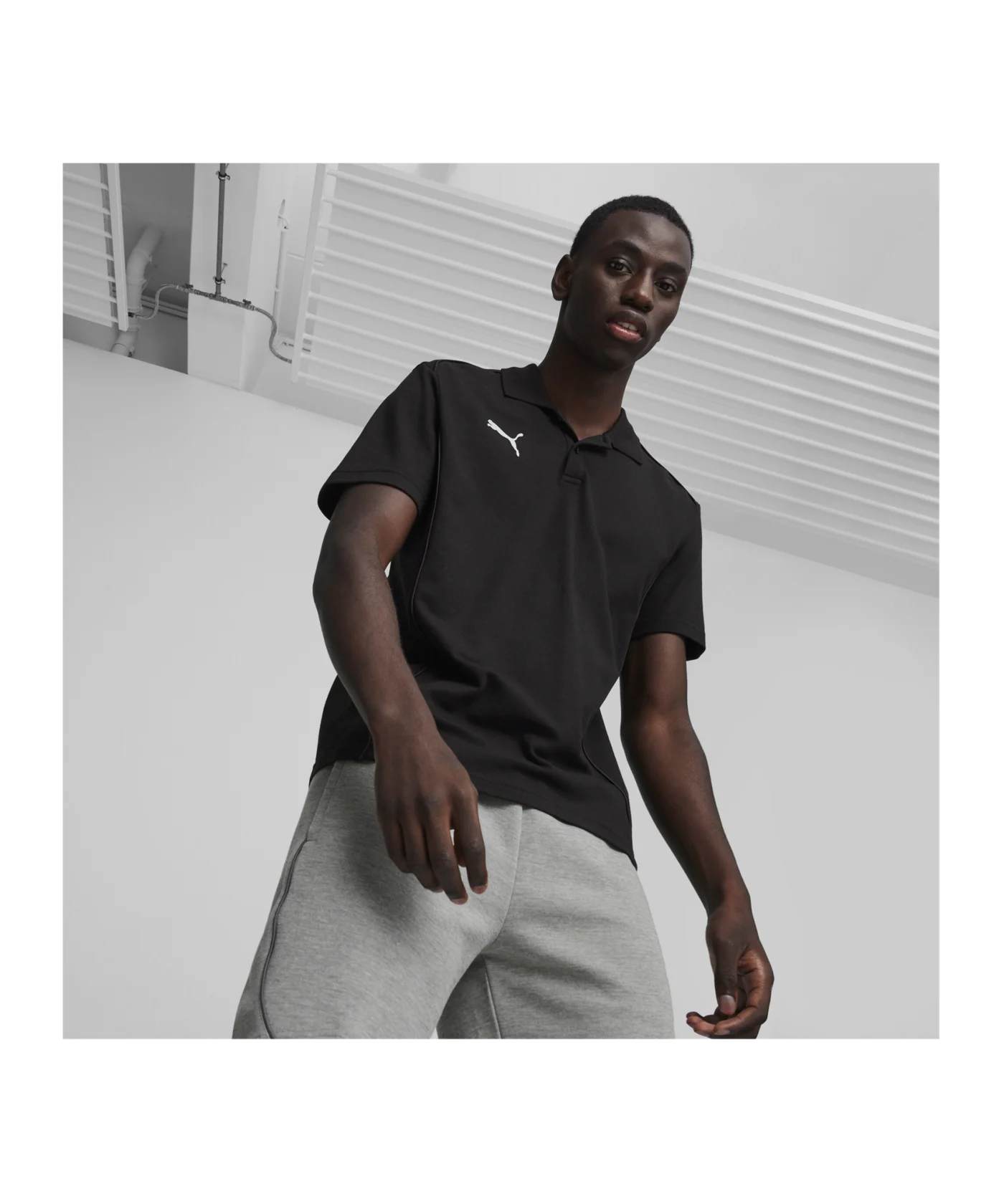 PUMA teamFINAL Casuals Poloshirt Schwarz F03