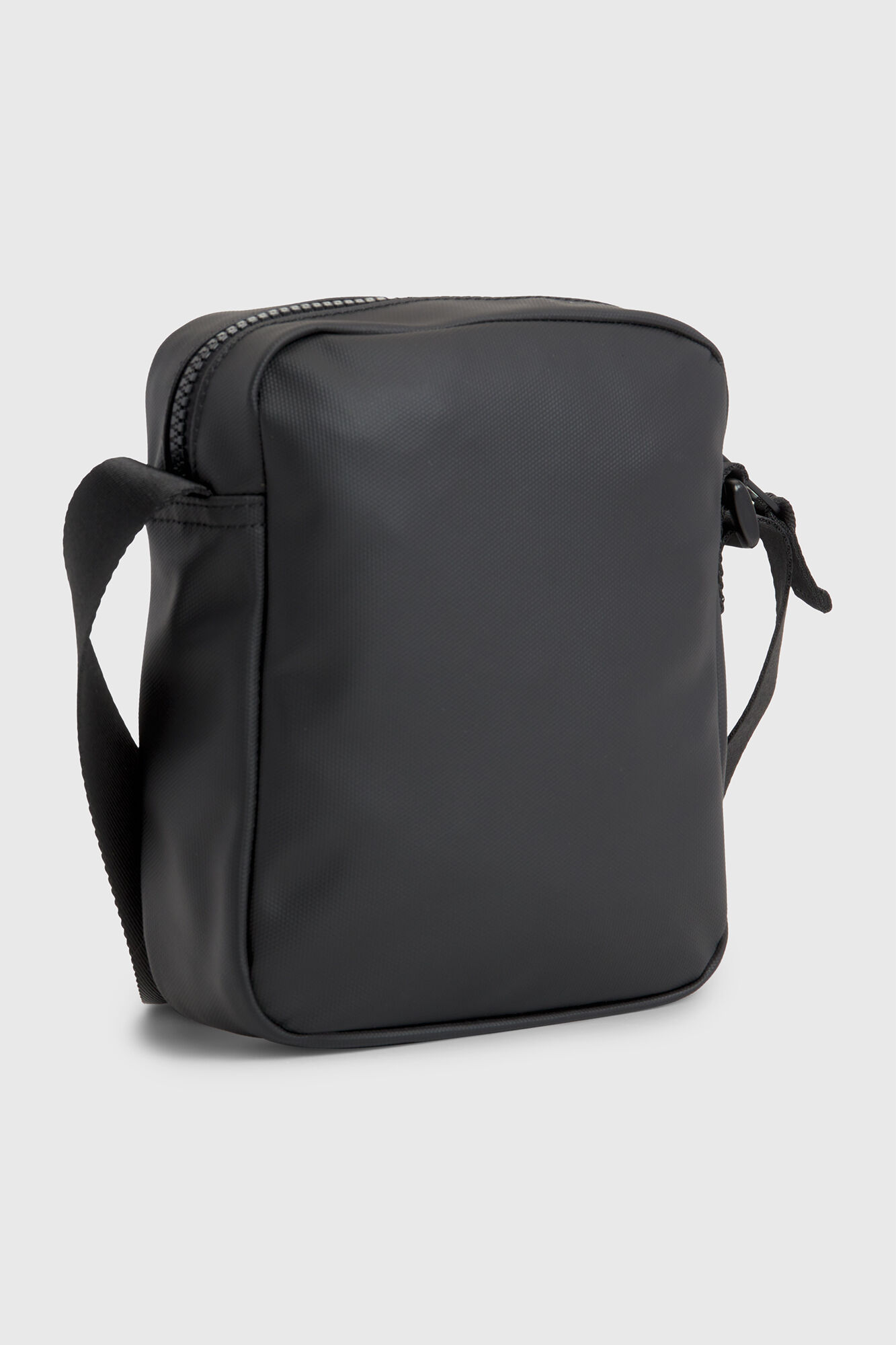 Bolsa de ombro masculina Tommy Jeans com bandeira.