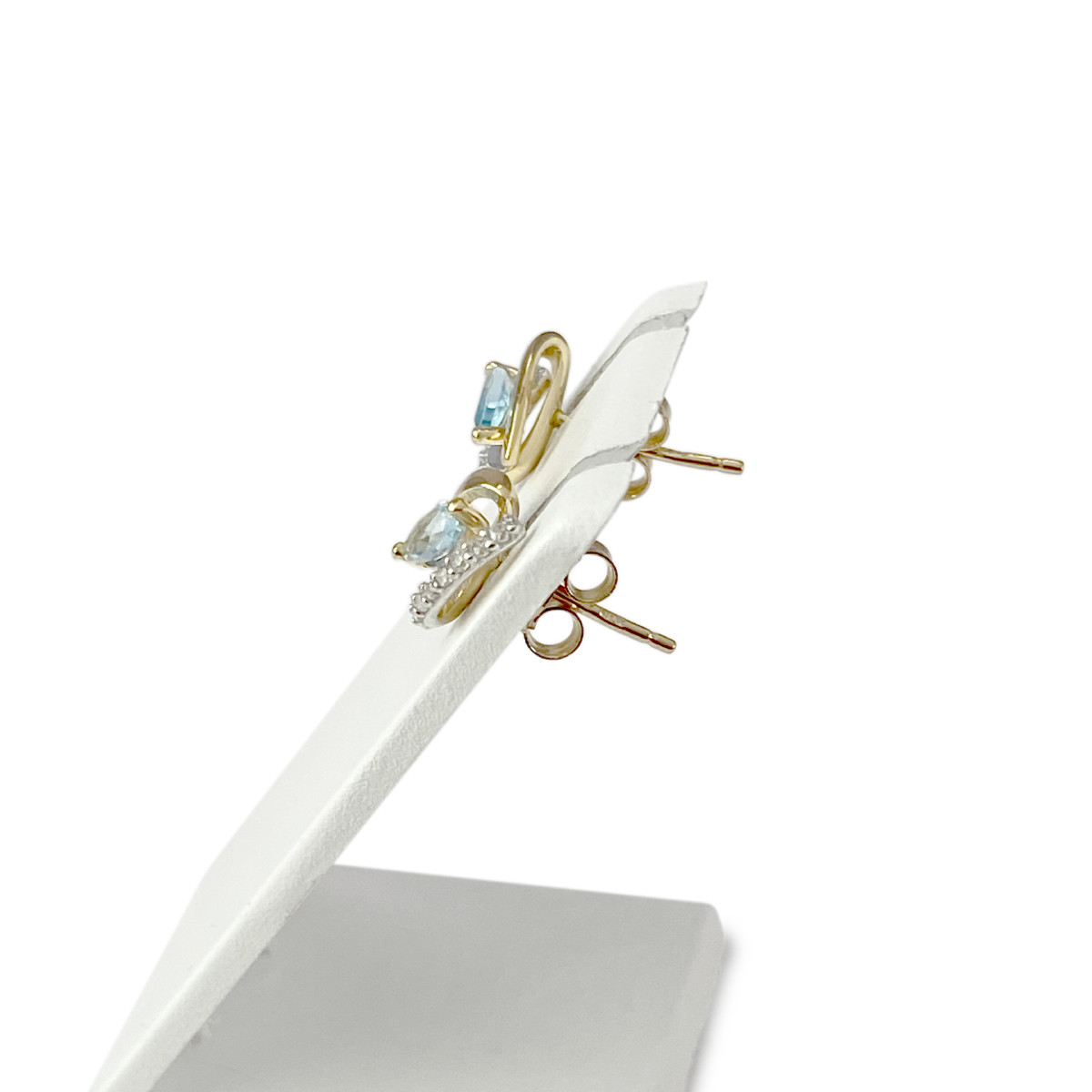 Boucles d'oreilles d'occasion or 375 jaune et rhodié topaze zirconias