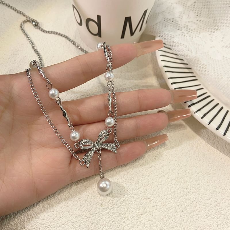 Milkieway - Nepparelketting met strass-strik
