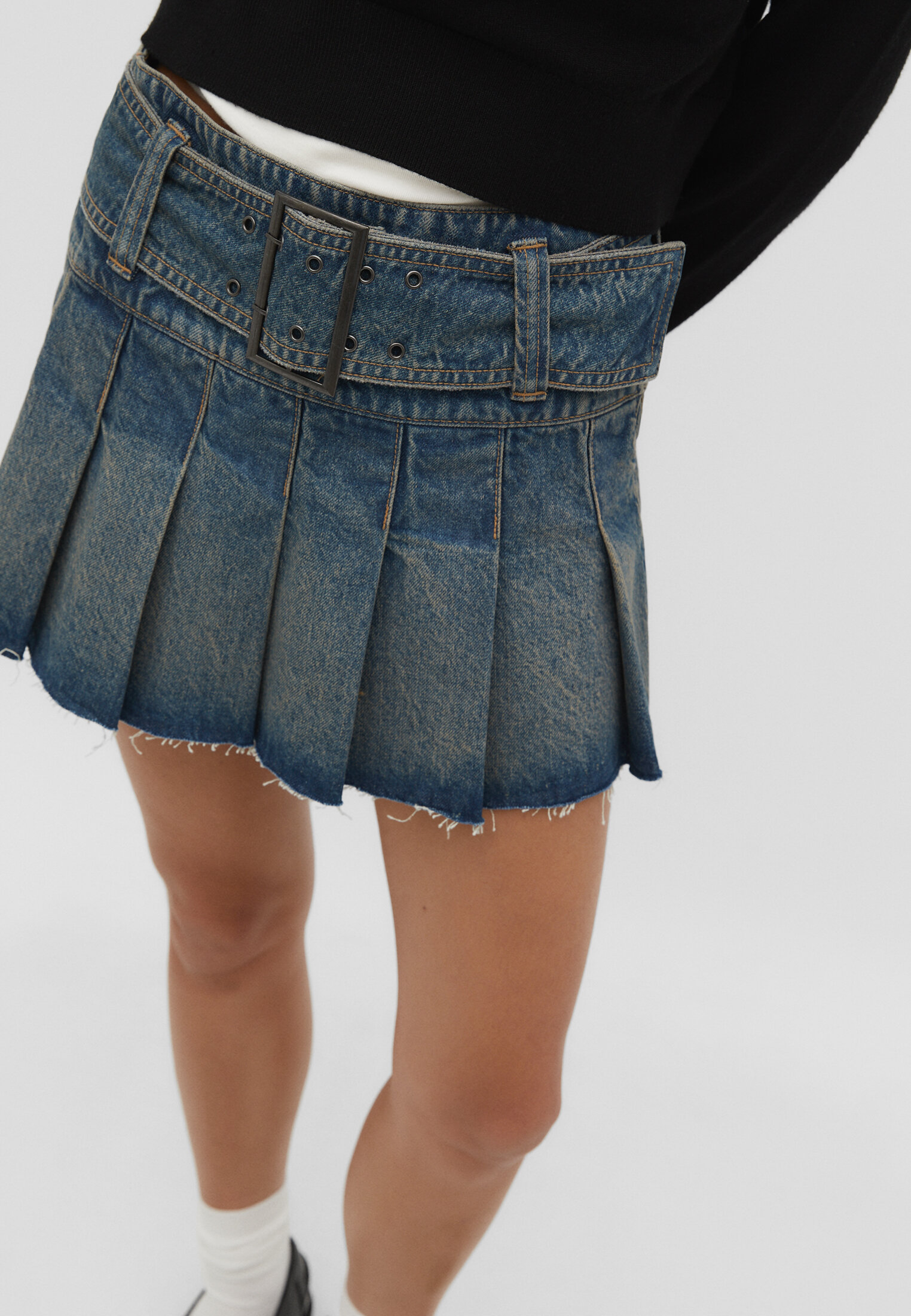 Minissaia jeans com pregas caixa