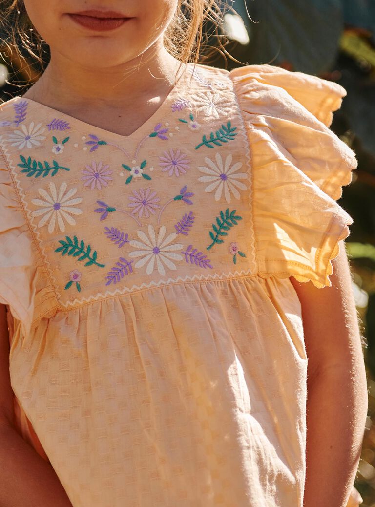 Blouse orange clémentine à broderies fleuries