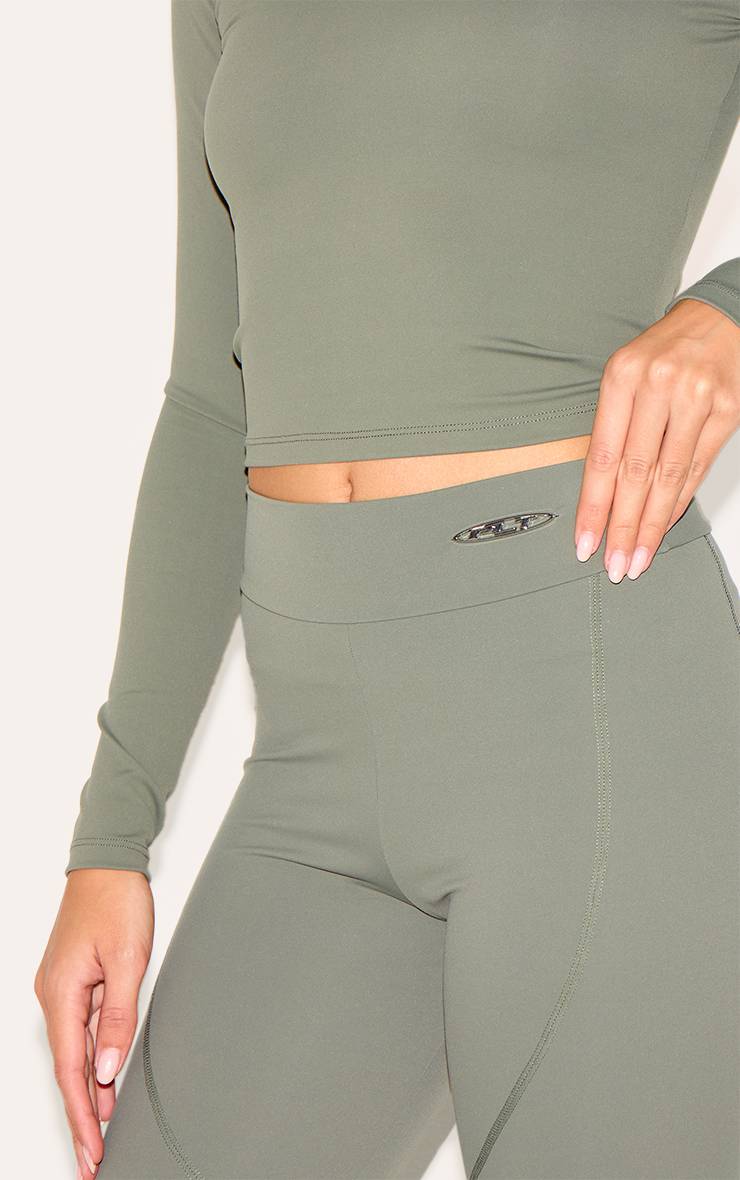 Vert Olive Pantalon Évasé Taille Haute Sculptant Avec Badge Métallique Sport