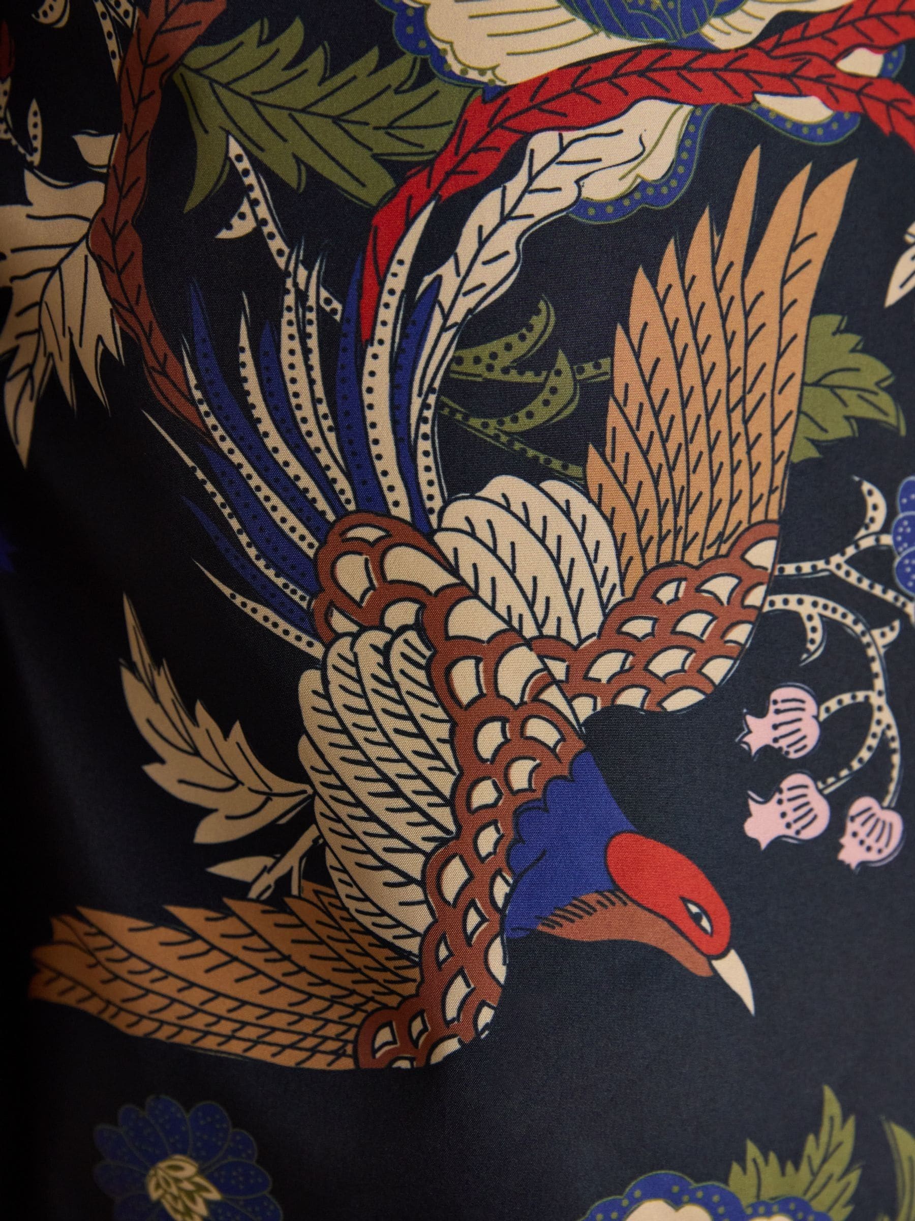 Marineblauw met vogel en bloemenprint - Joules Holkham waterdichte opvouwbare regenjas met capuchon