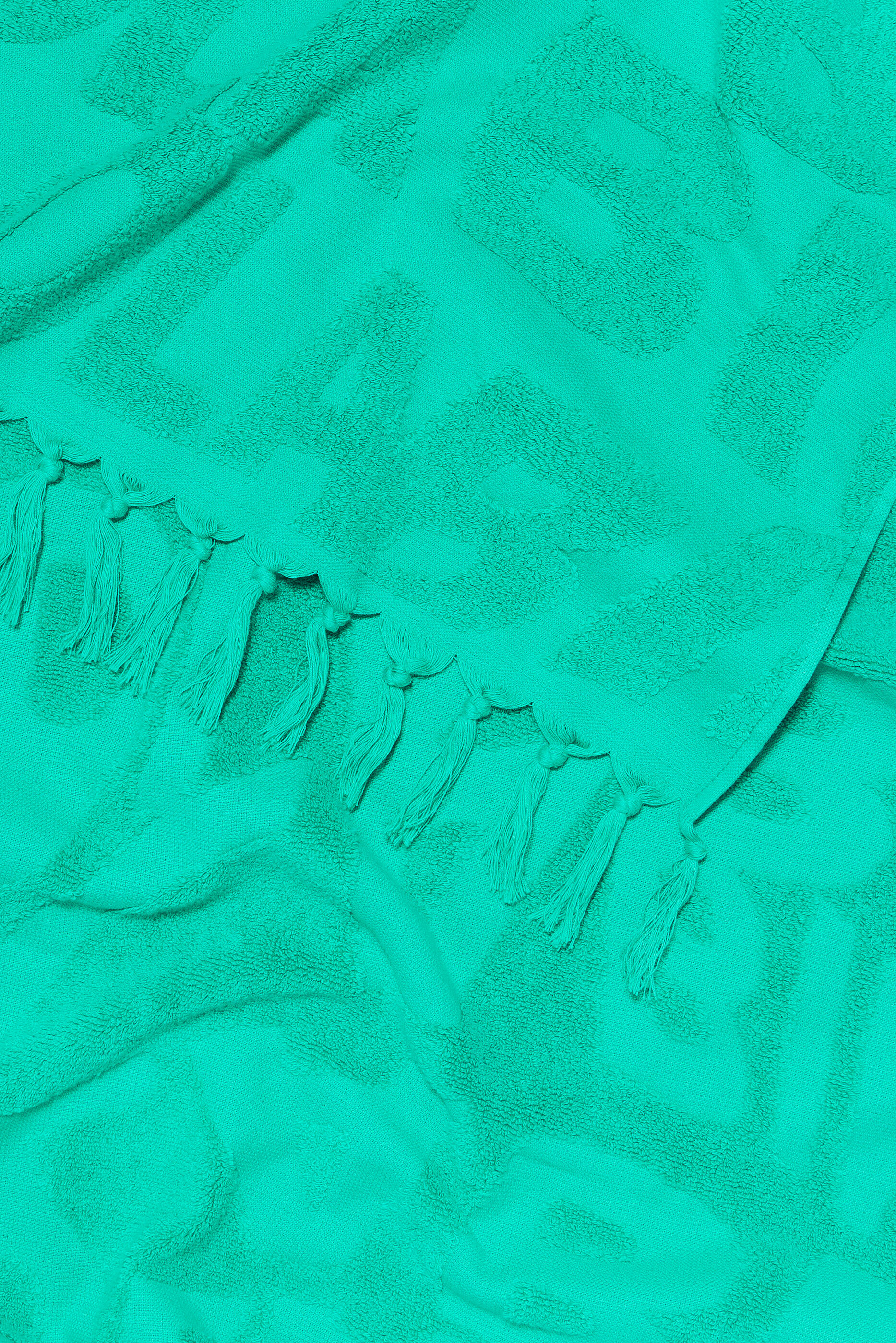 Toalha com logotipo em jacquard turquesa