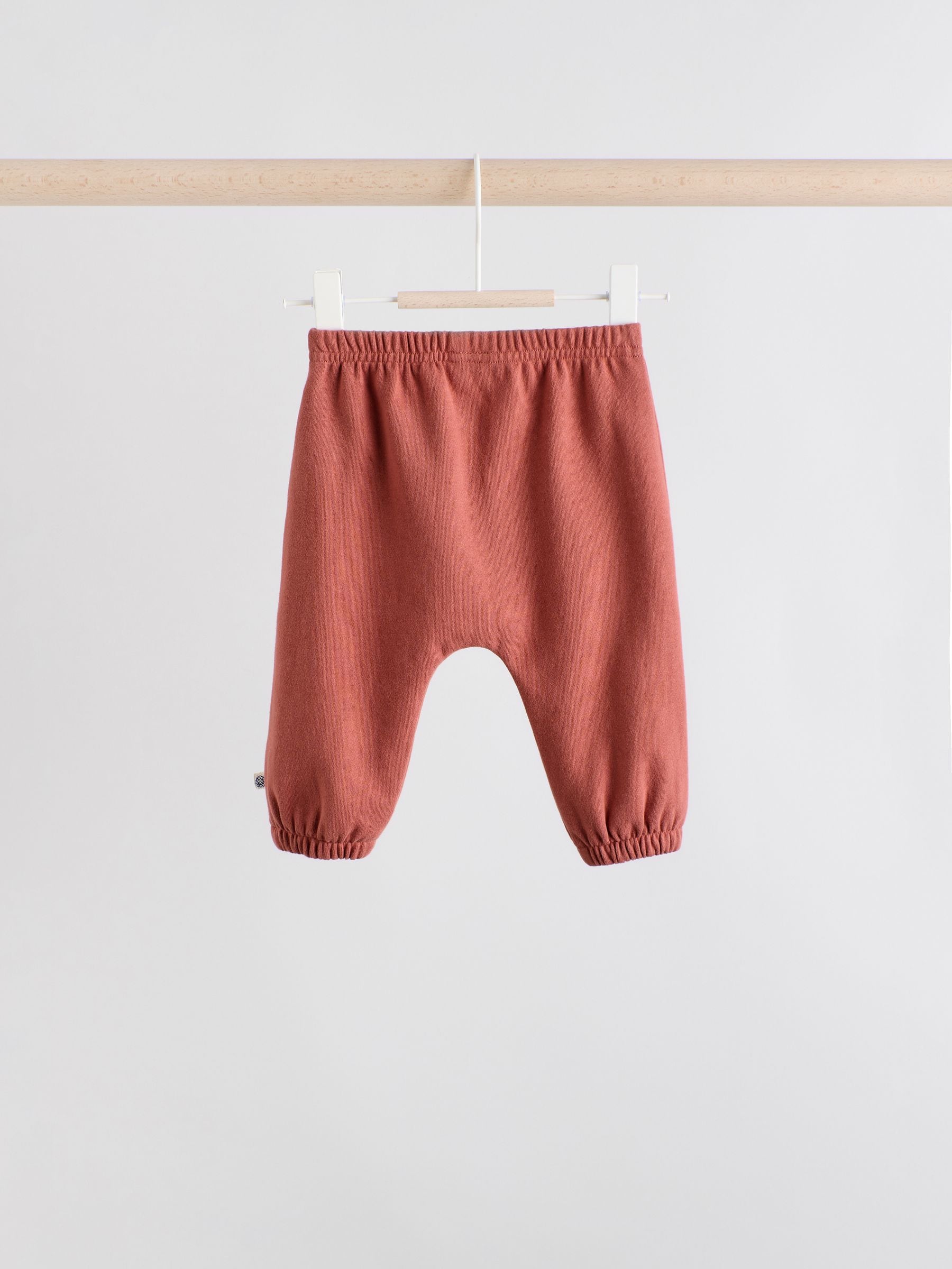 Blauwe gezichten met dambordmotief - Set van fleece top en joggingbroek voor baby's (0mnd -2jr)