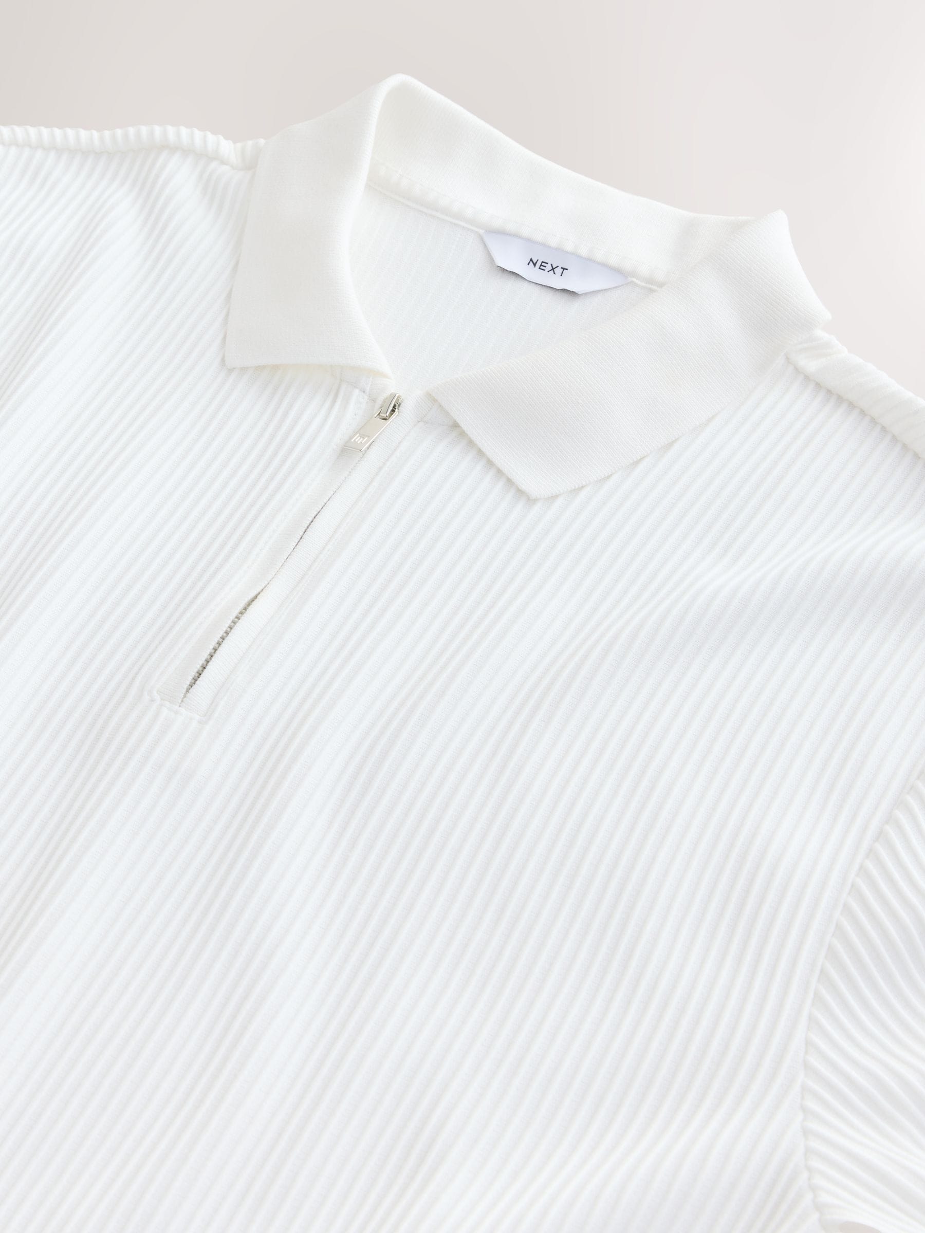 Ecru wit - Smart poloshirt met textuur en rits