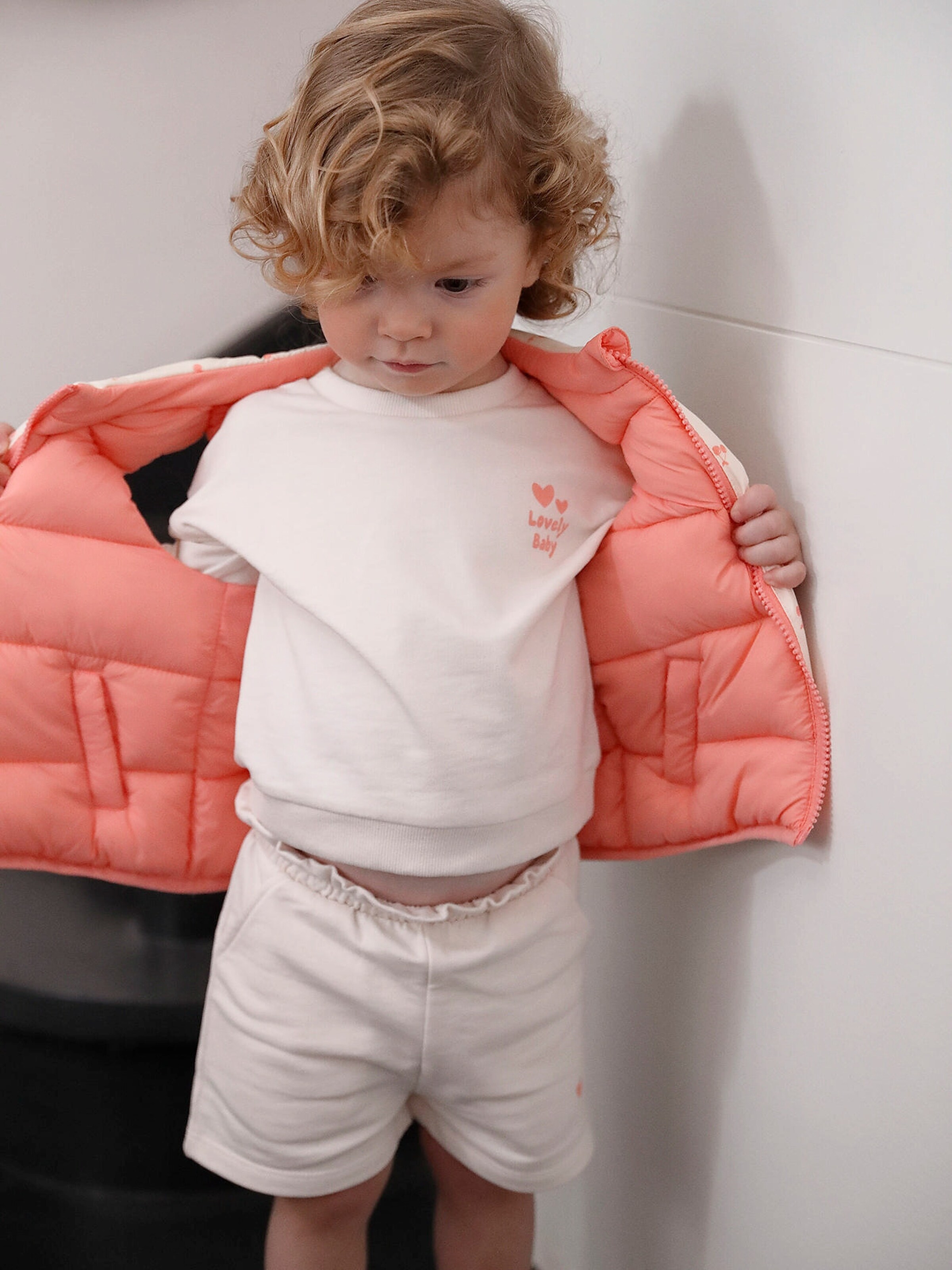 Vertbaudet Baby Wende-Steppweste mit Recycling-Polyester koralle