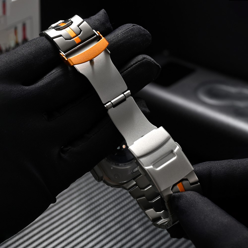Apple Watch (49/46/45/44 mm) Edelstahl Reifenmuster Armband mit Faltschliesse (Gelenkumfang: 175 - 240 mm) - Titan / Orange