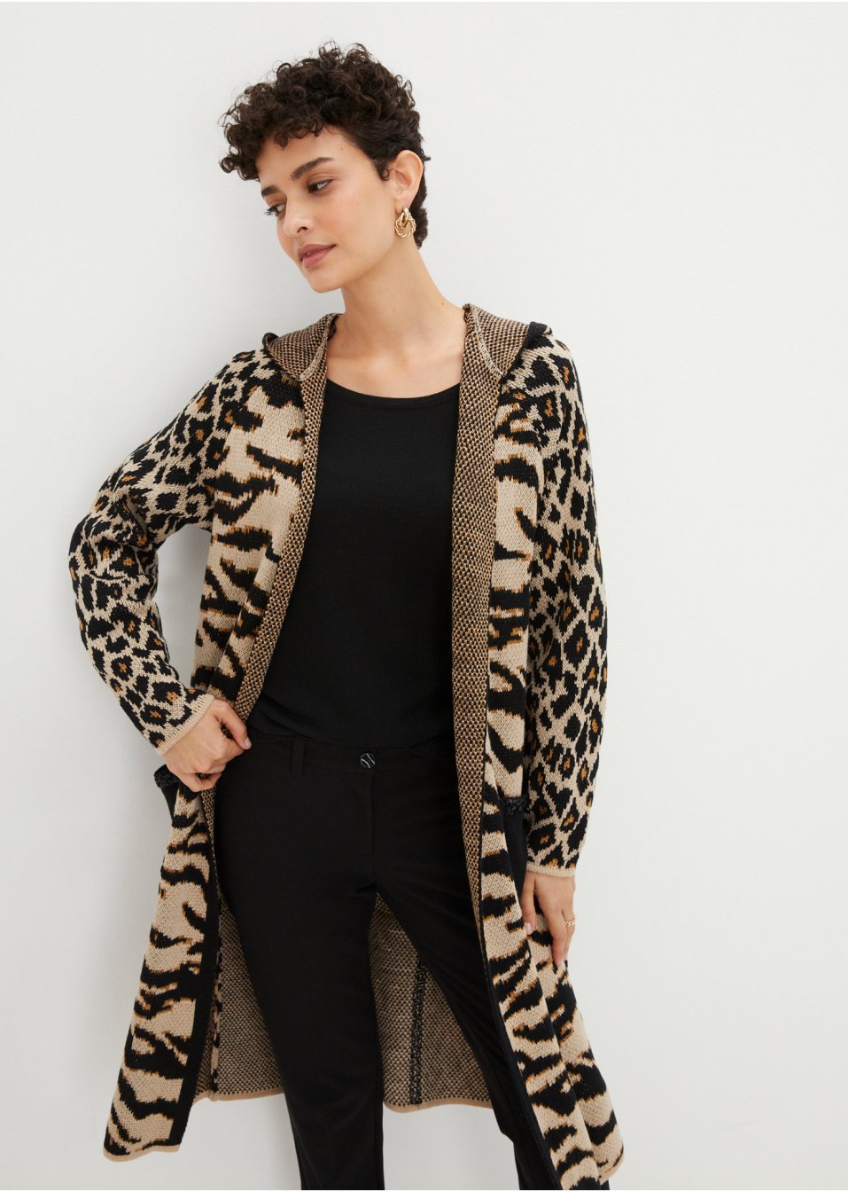 Manteau en maille avec paillettes et capuche