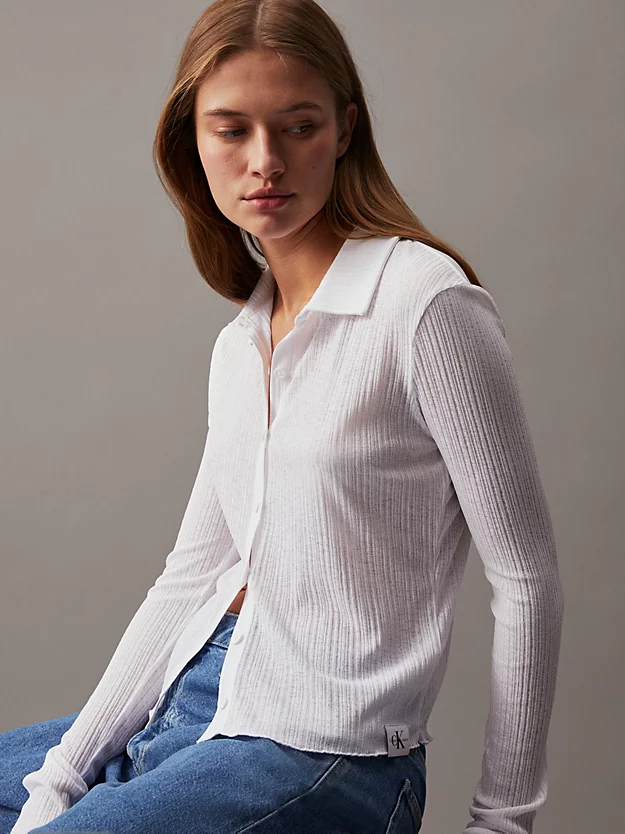 Camisa justa canelada transparente