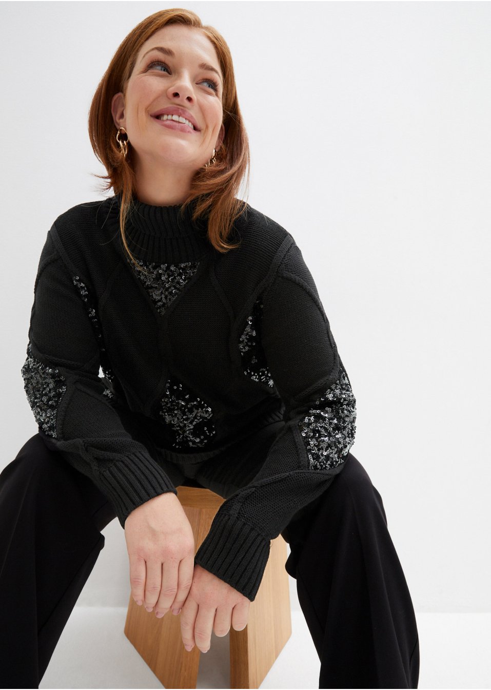 Pull en maille torsadée avec paillettes