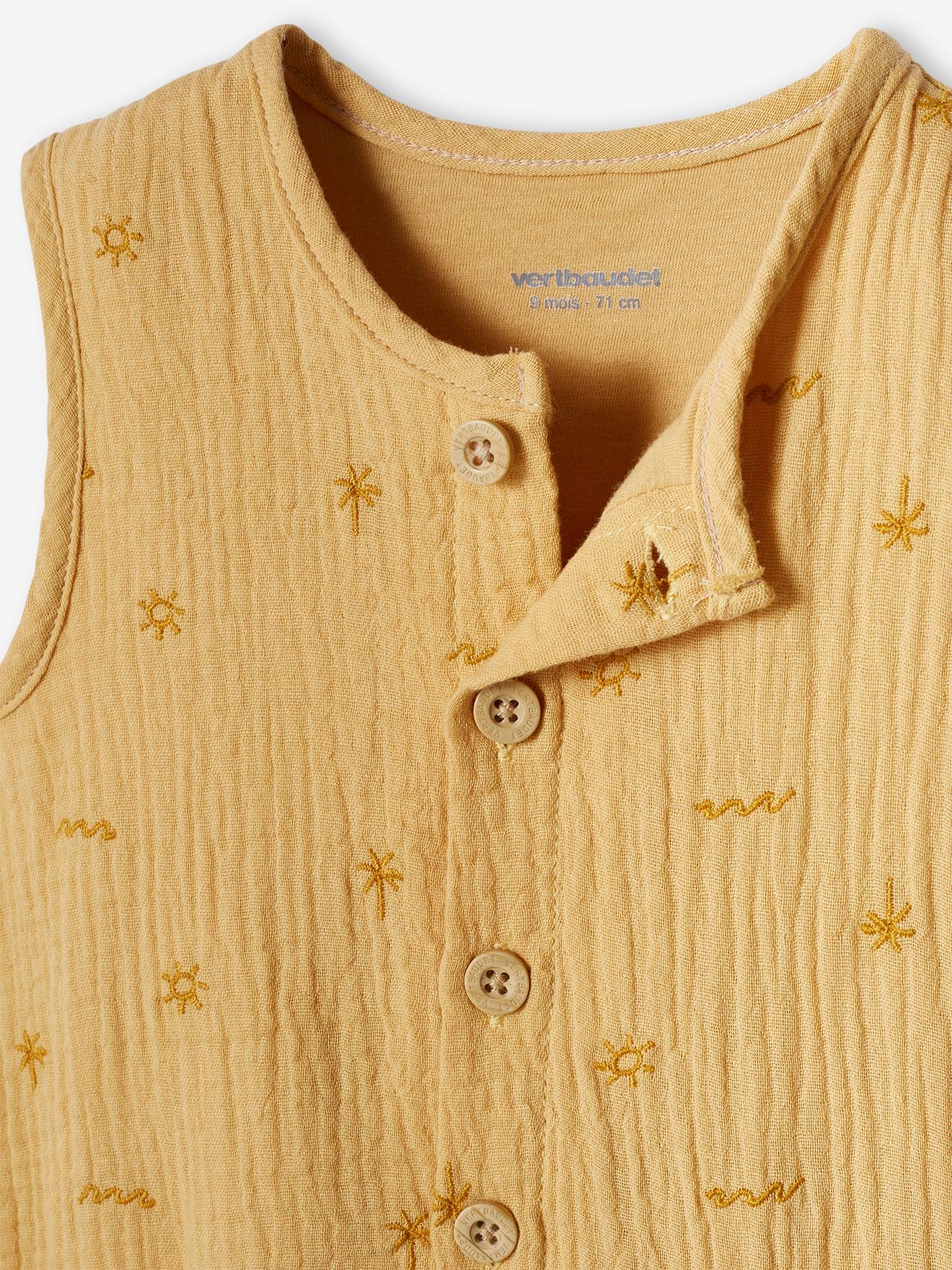 Macacão amarelo claro bordado em chiffon de algodão para recém-nascido.