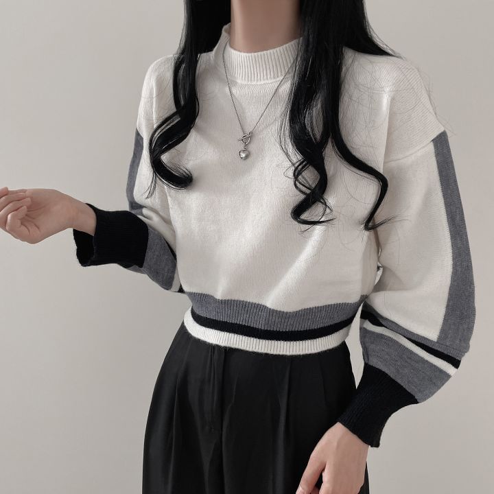 FR - Trui met hoge hals en pofmouwen en geometrische print
