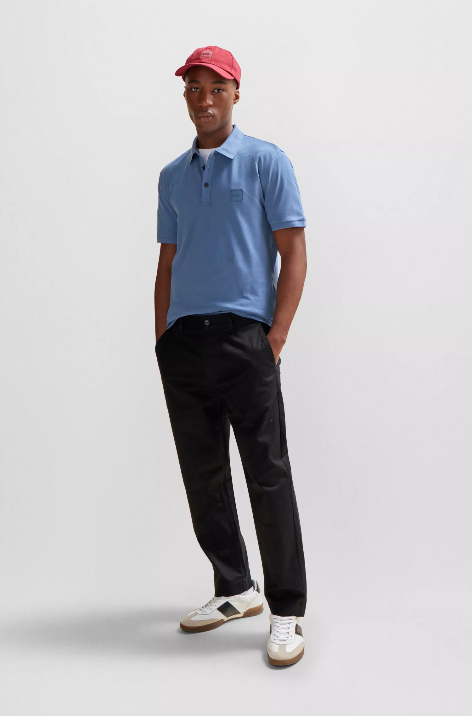 Camisa polo BOSS laranja, de algodão stretch, corte slim, com etiqueta de logotipo.