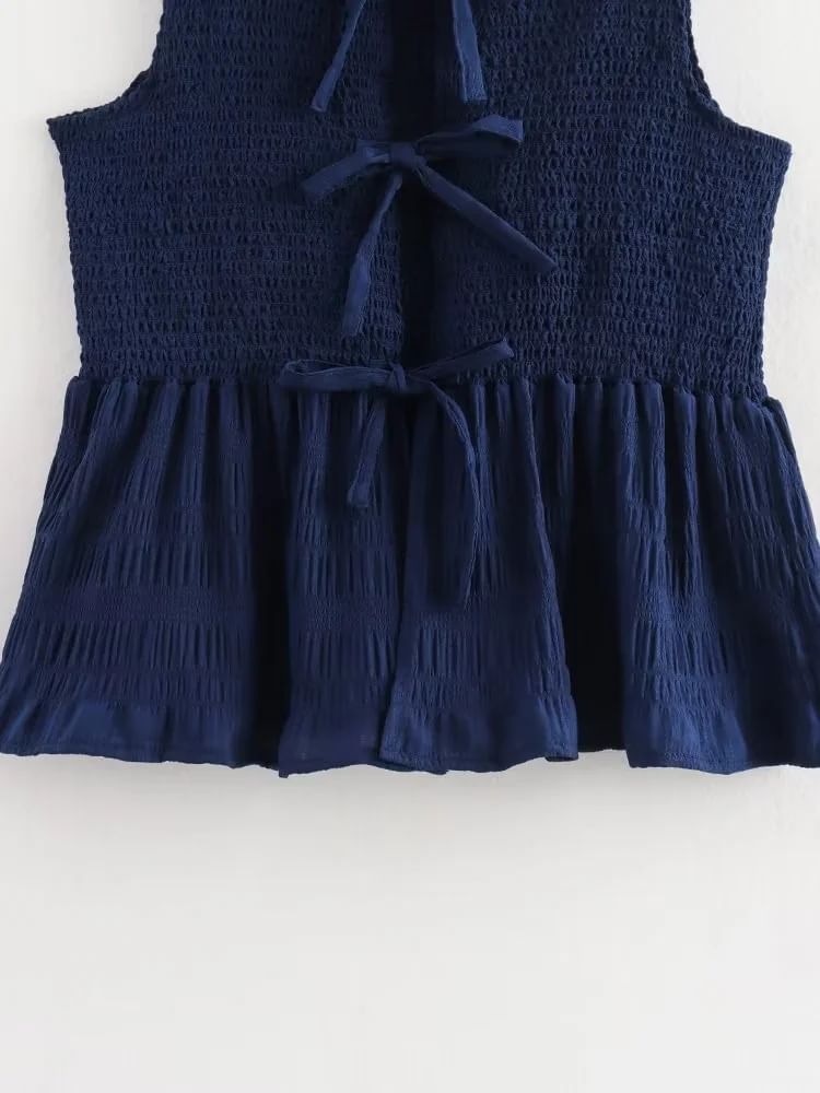 Omelia - Mouwloze blouse met strik / Hoge taille en wijde pijpen