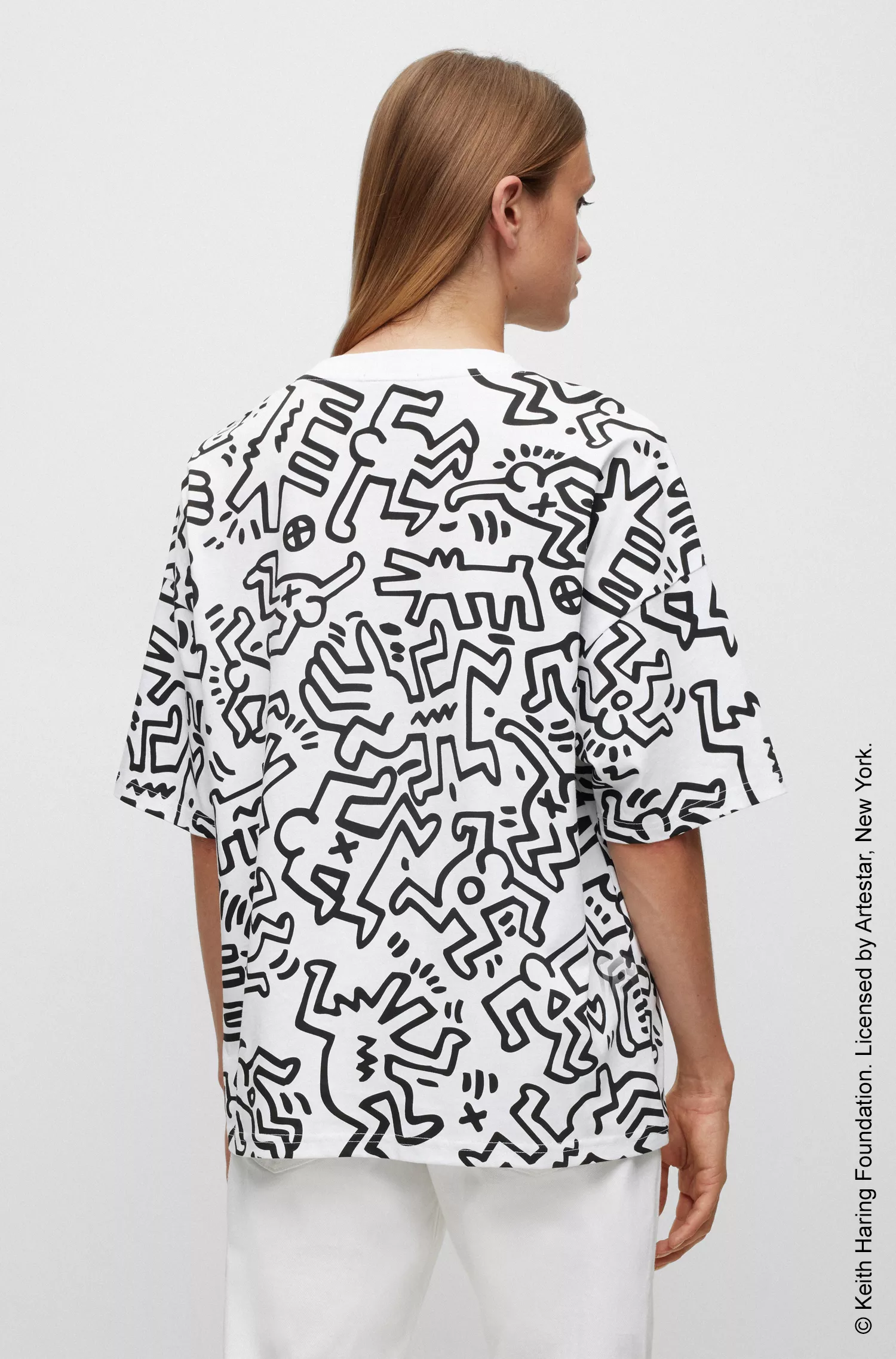 Camiseta preta BOSS x Keith Haring com estampa unissex em malha de algodão.