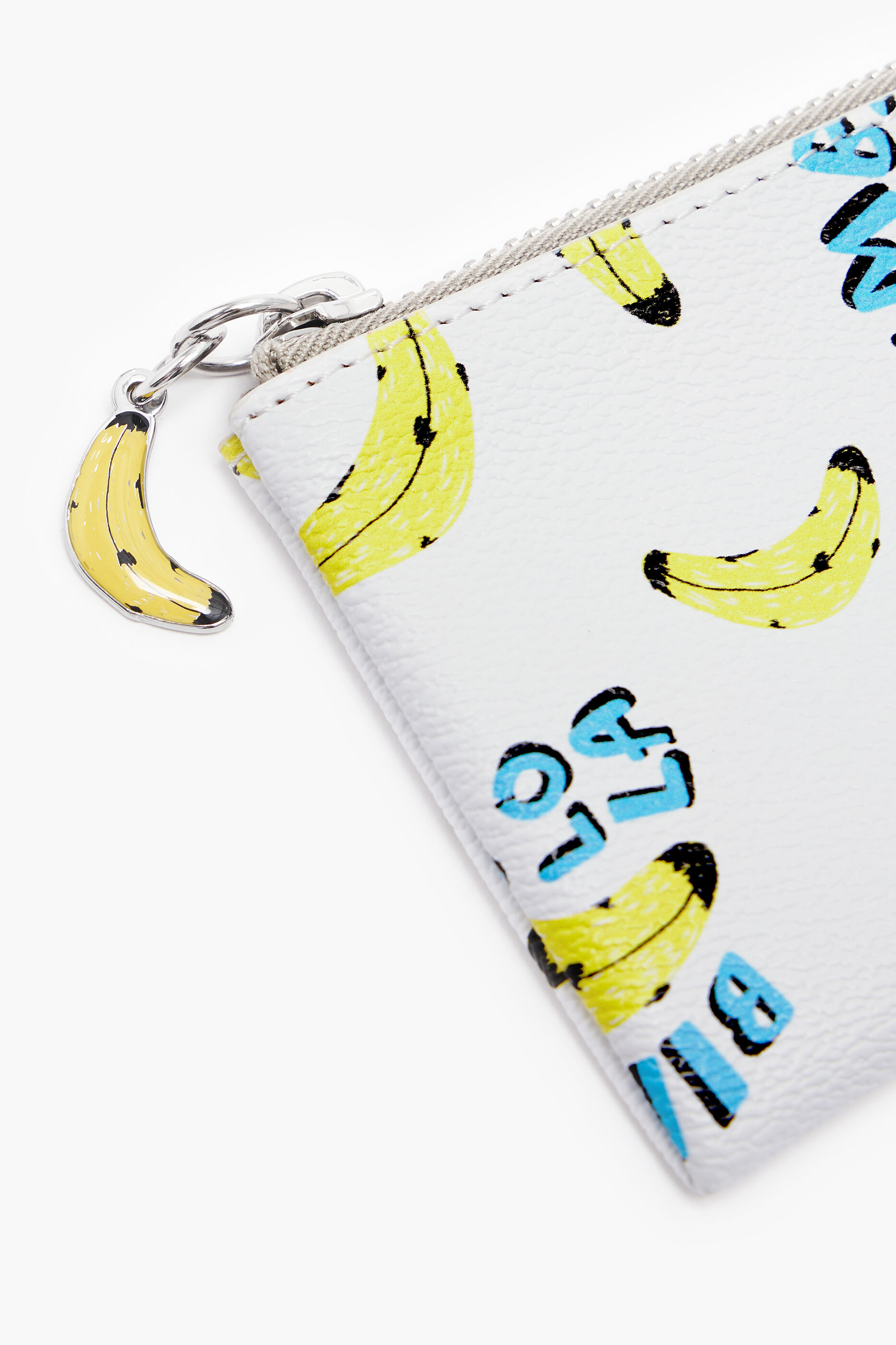Porta-moedas retangular branco com textura de estampa de banana.