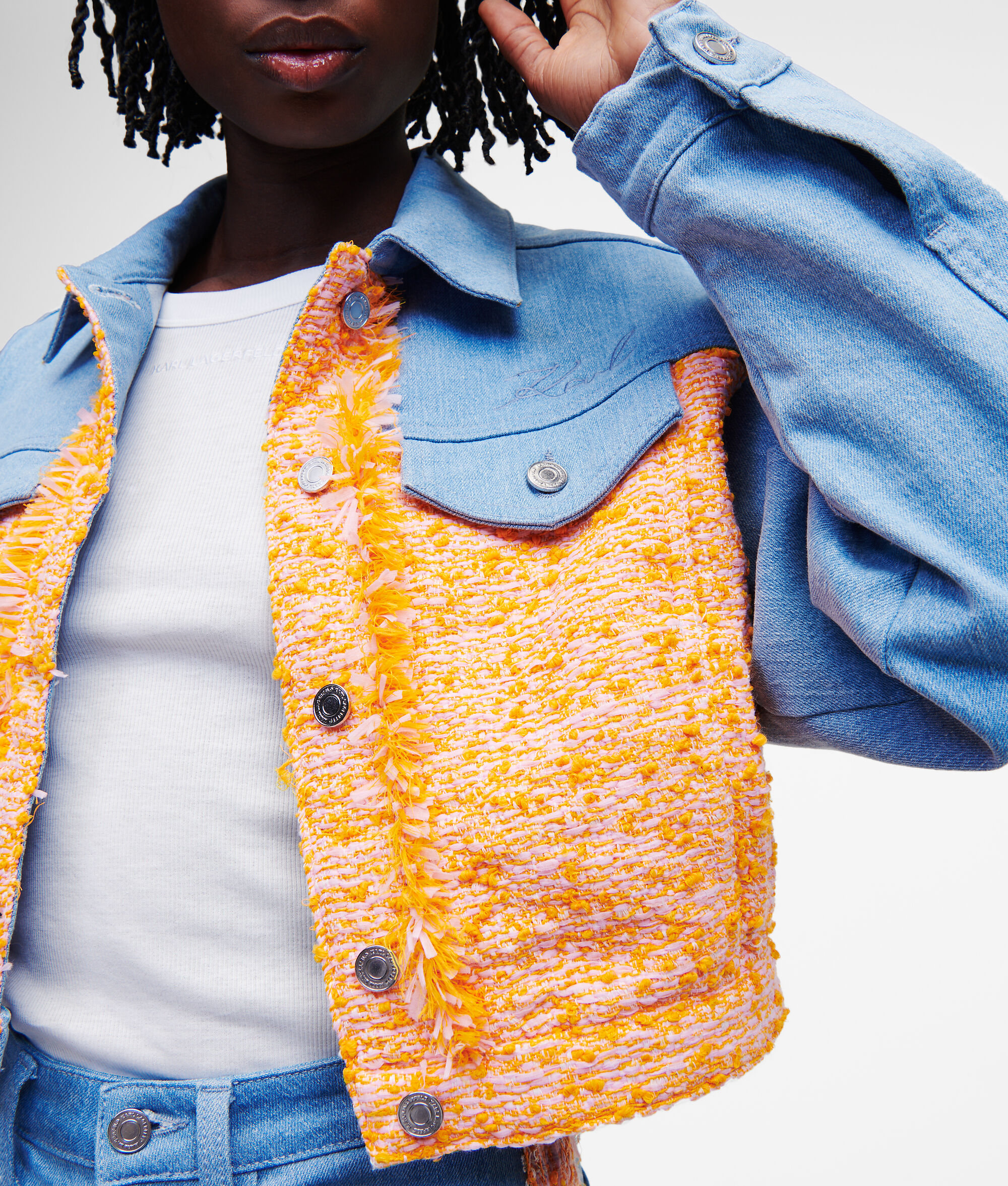 VESTE EN JEAN ET EN TISSU BOUCLÉ