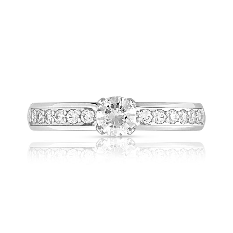 Bague solitaire or 750 blanc diamant 60/100e de carat
